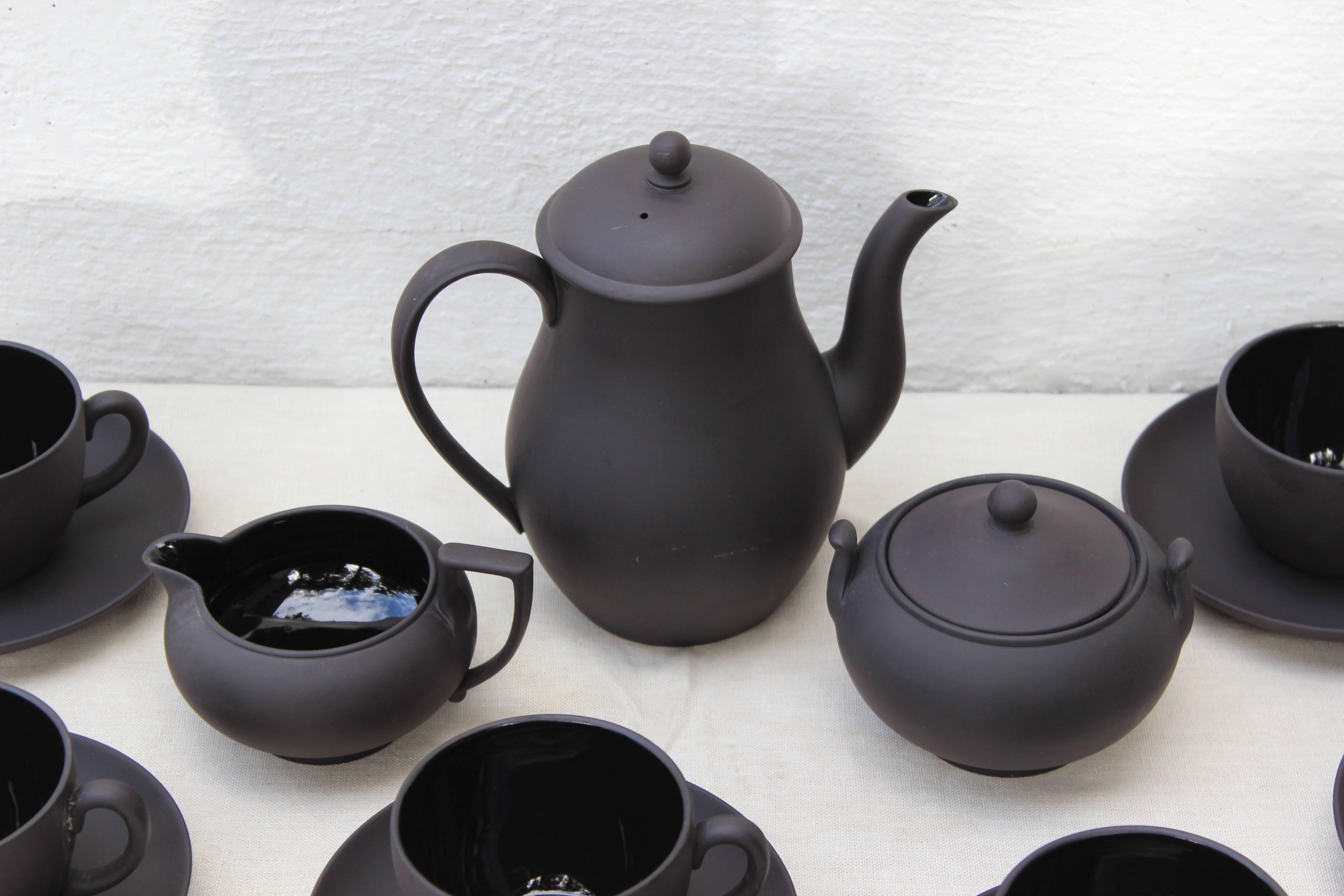 Basalt Wedgwood tea set consists of:

Measures: Tea pot - 6.75