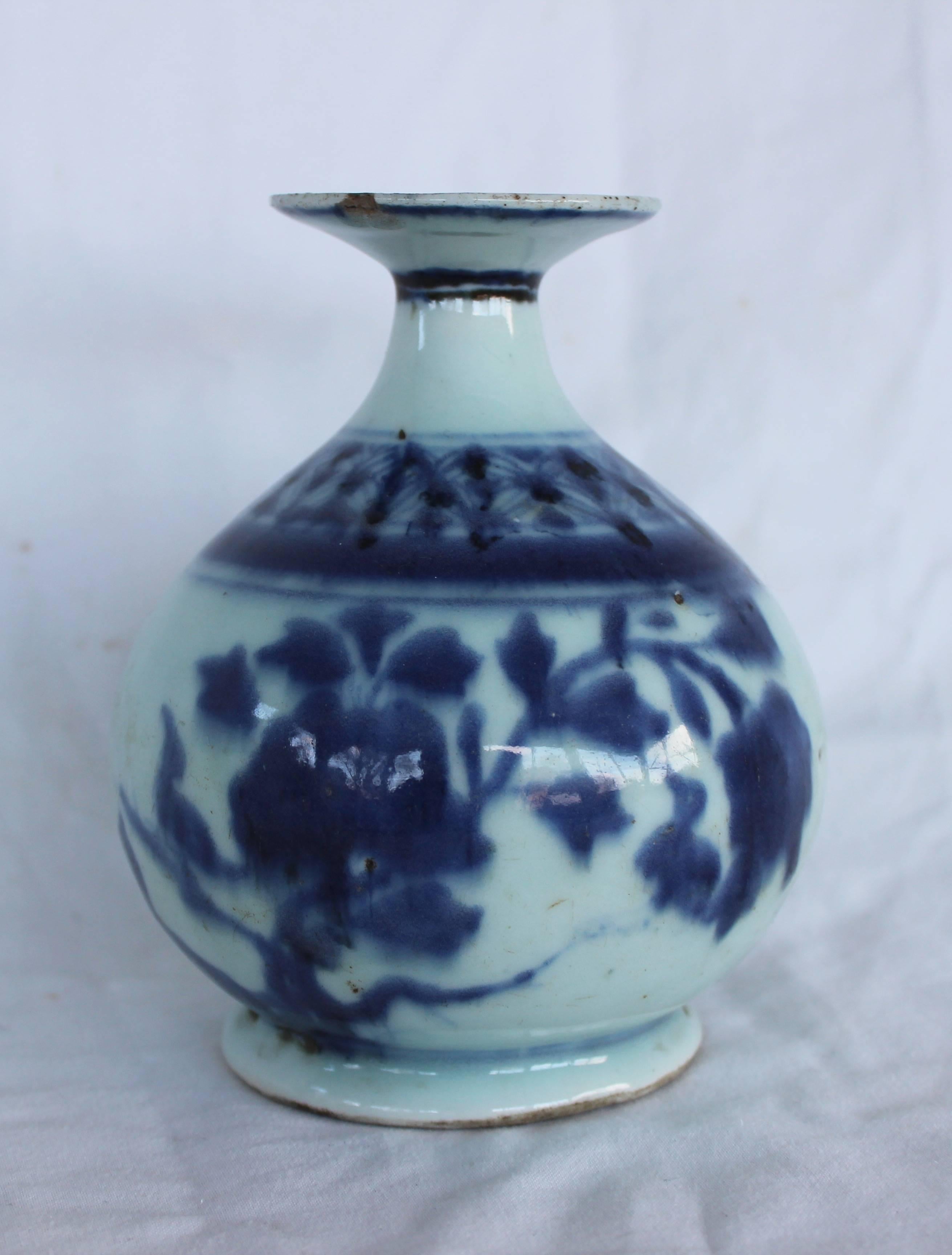 Chinese blue and white ceramic bud vase.
