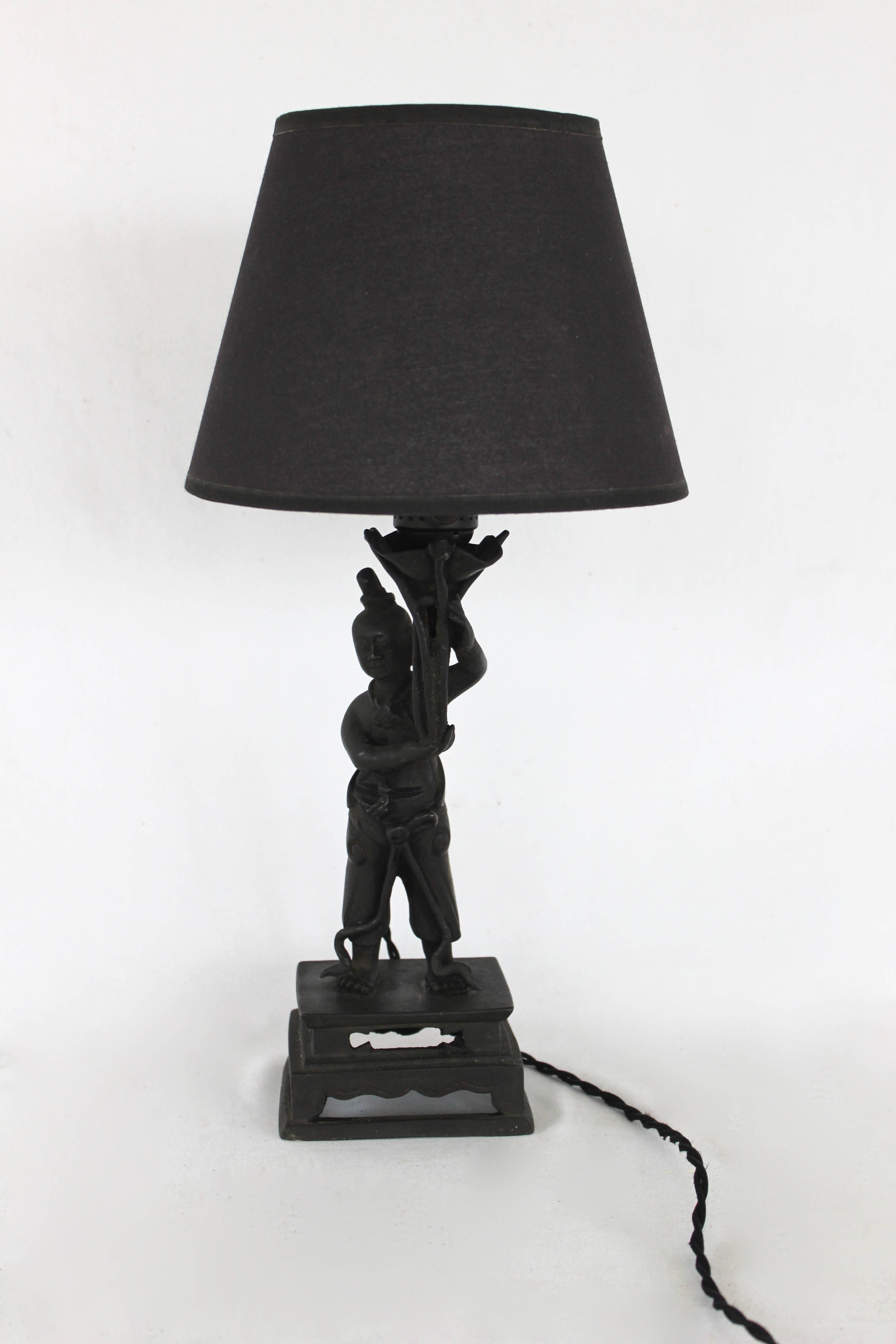 Figural metal table lamp. 

Newly French wired.