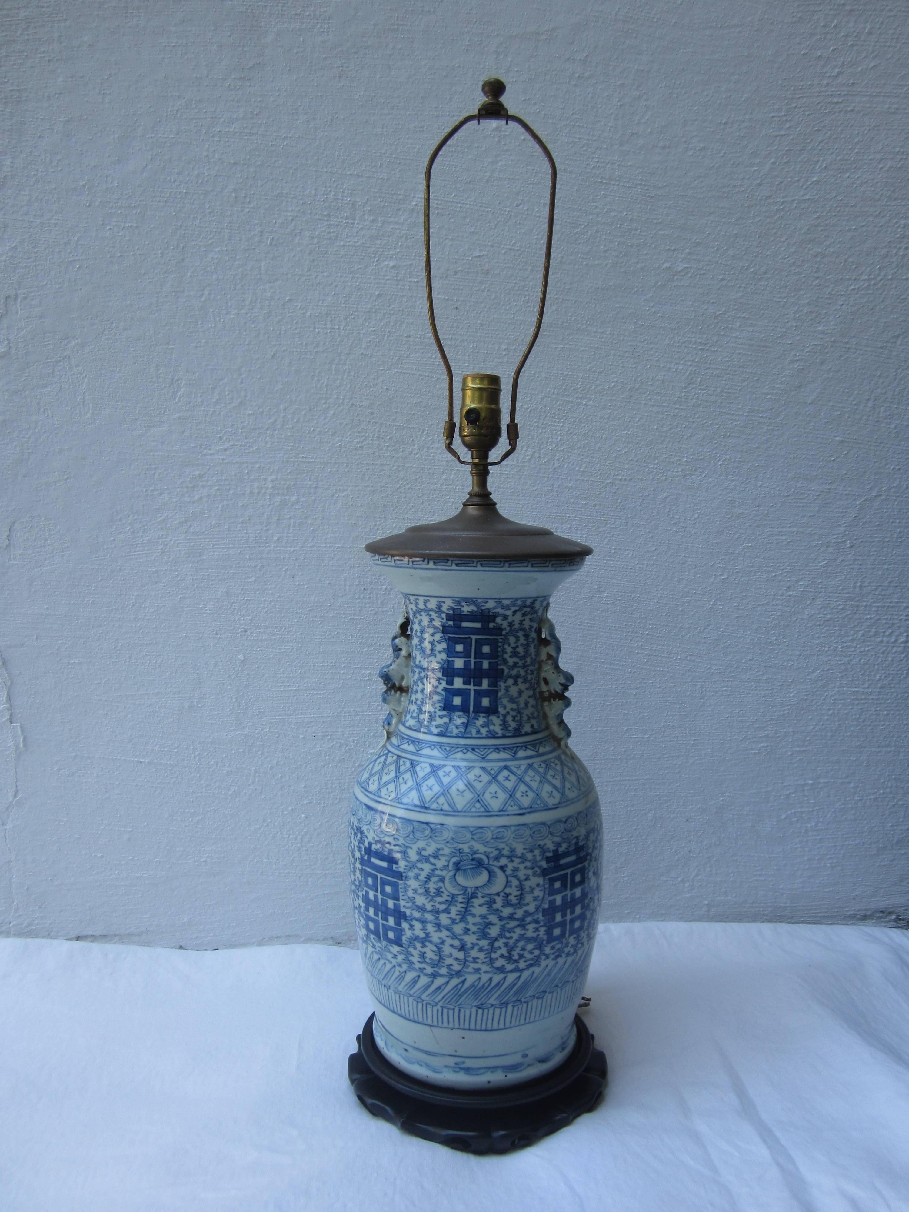 Large antique Chinese blue and white vase lamp.