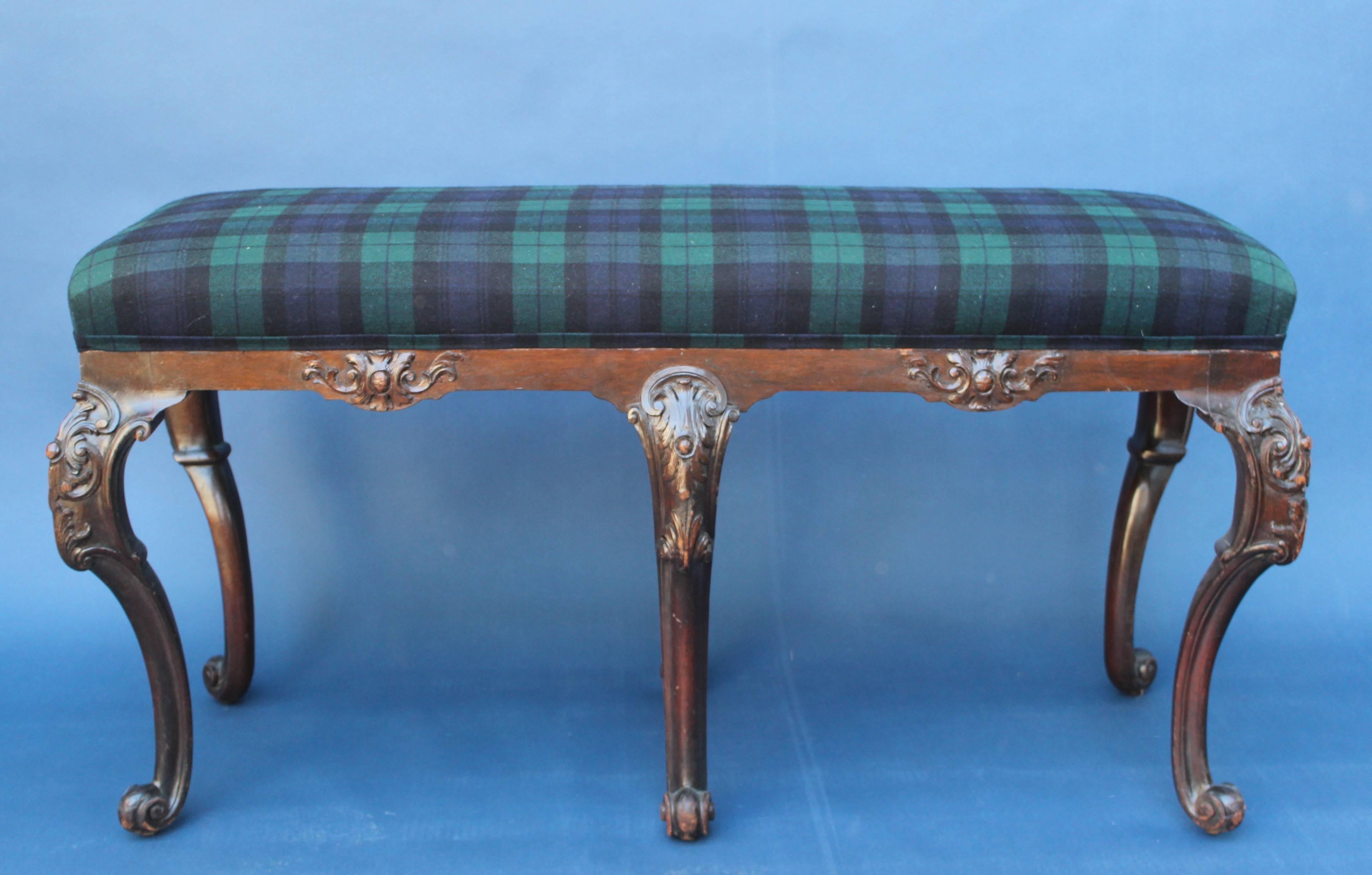 Handsome George III style bench upholstered in black watch plaid wool six legs.