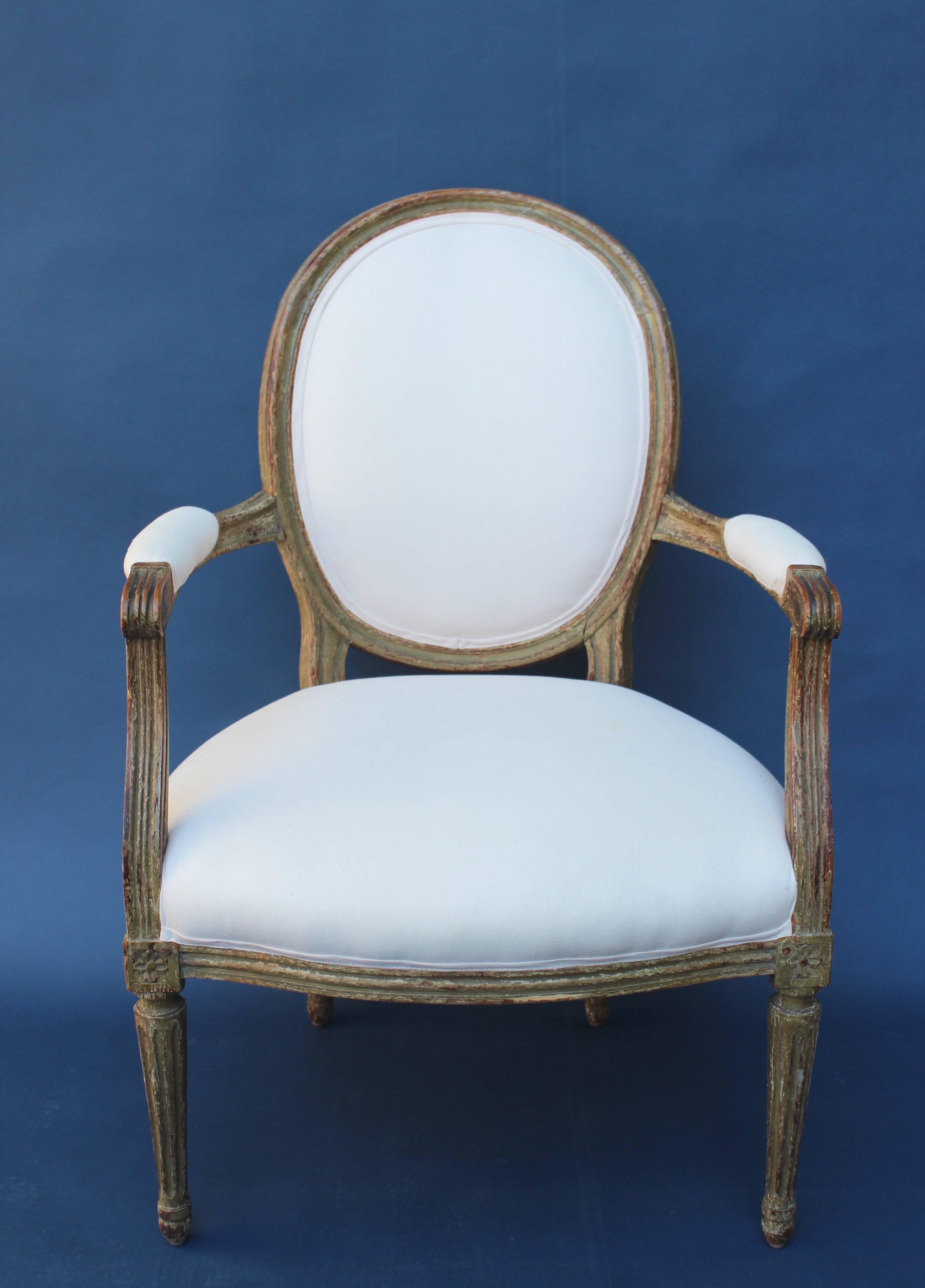 Luis XVI style armchair newly upholstered in light pink linen.