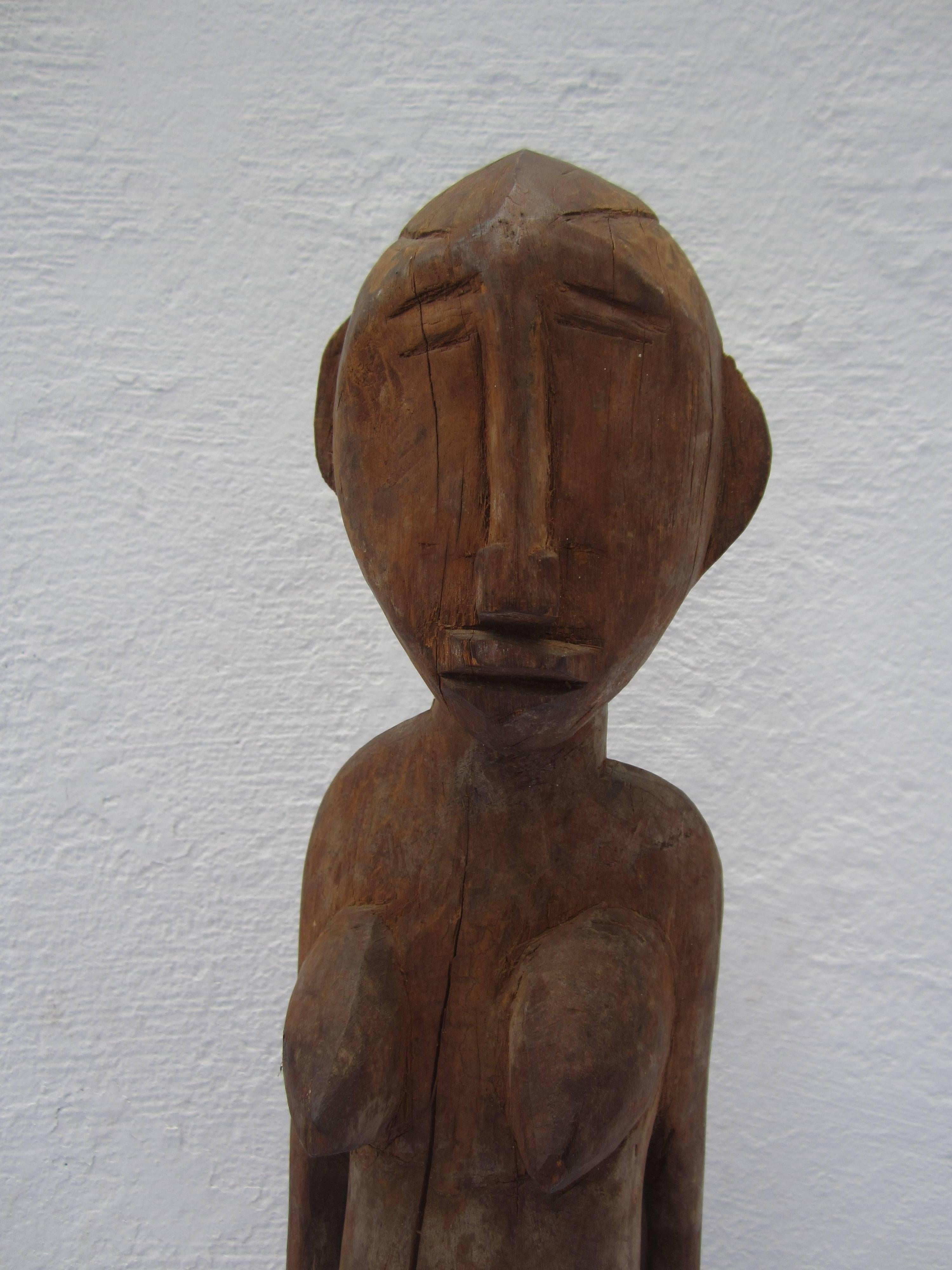 Tribal wood carved statue. Unknown origin.