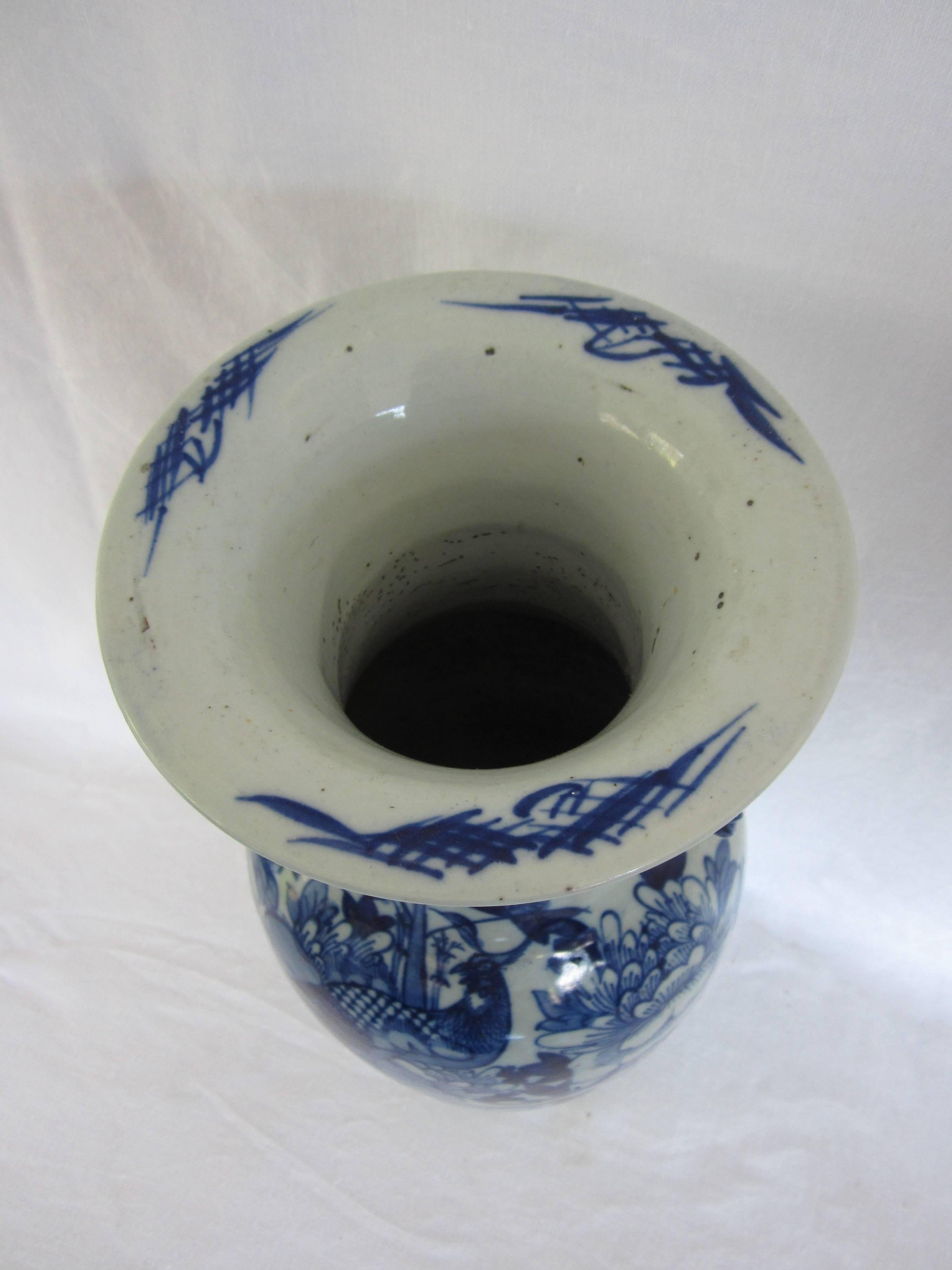 Chinese blue and white vase with handles.