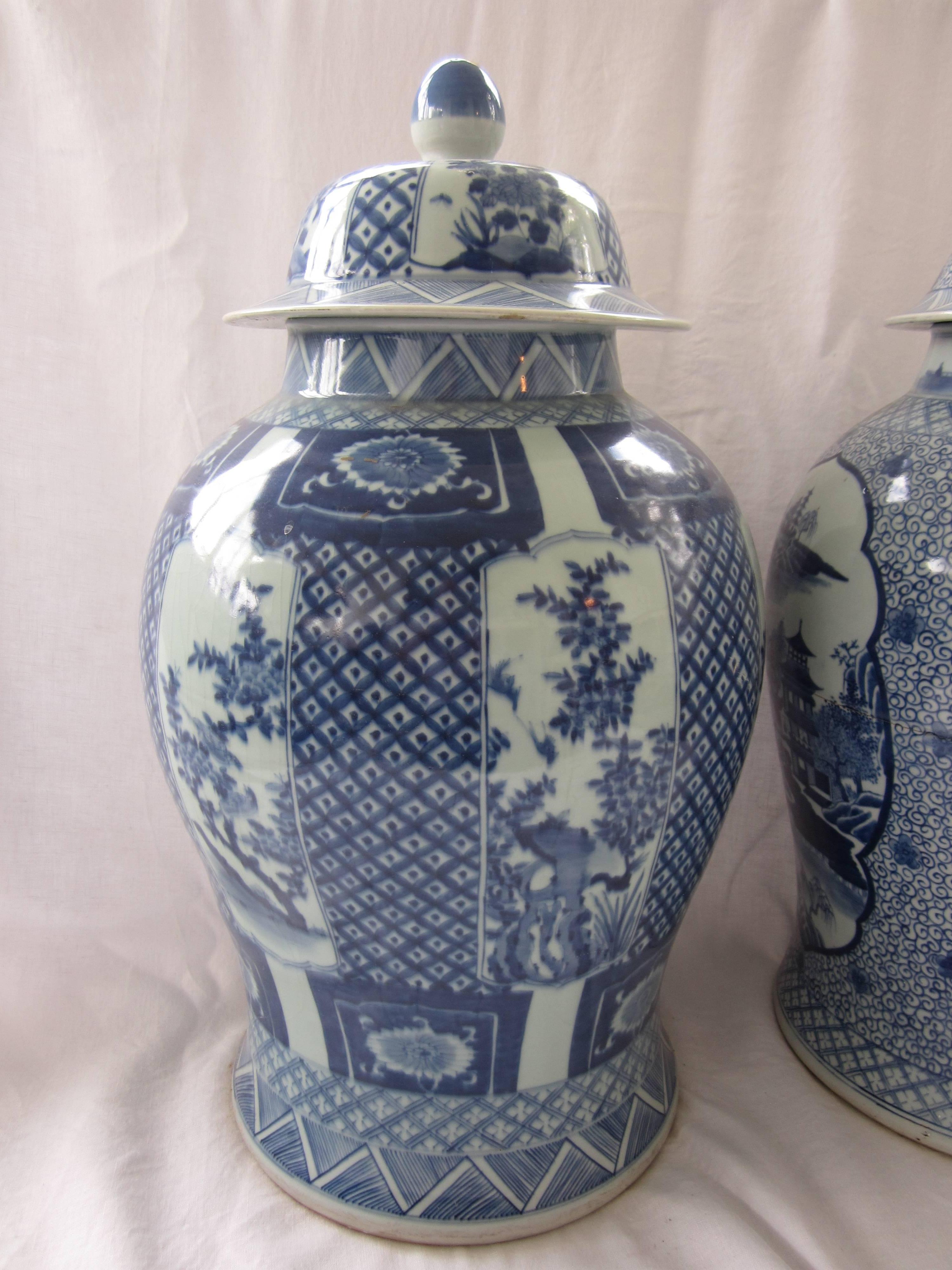 Pair of Chinese blue and white jars with lids.