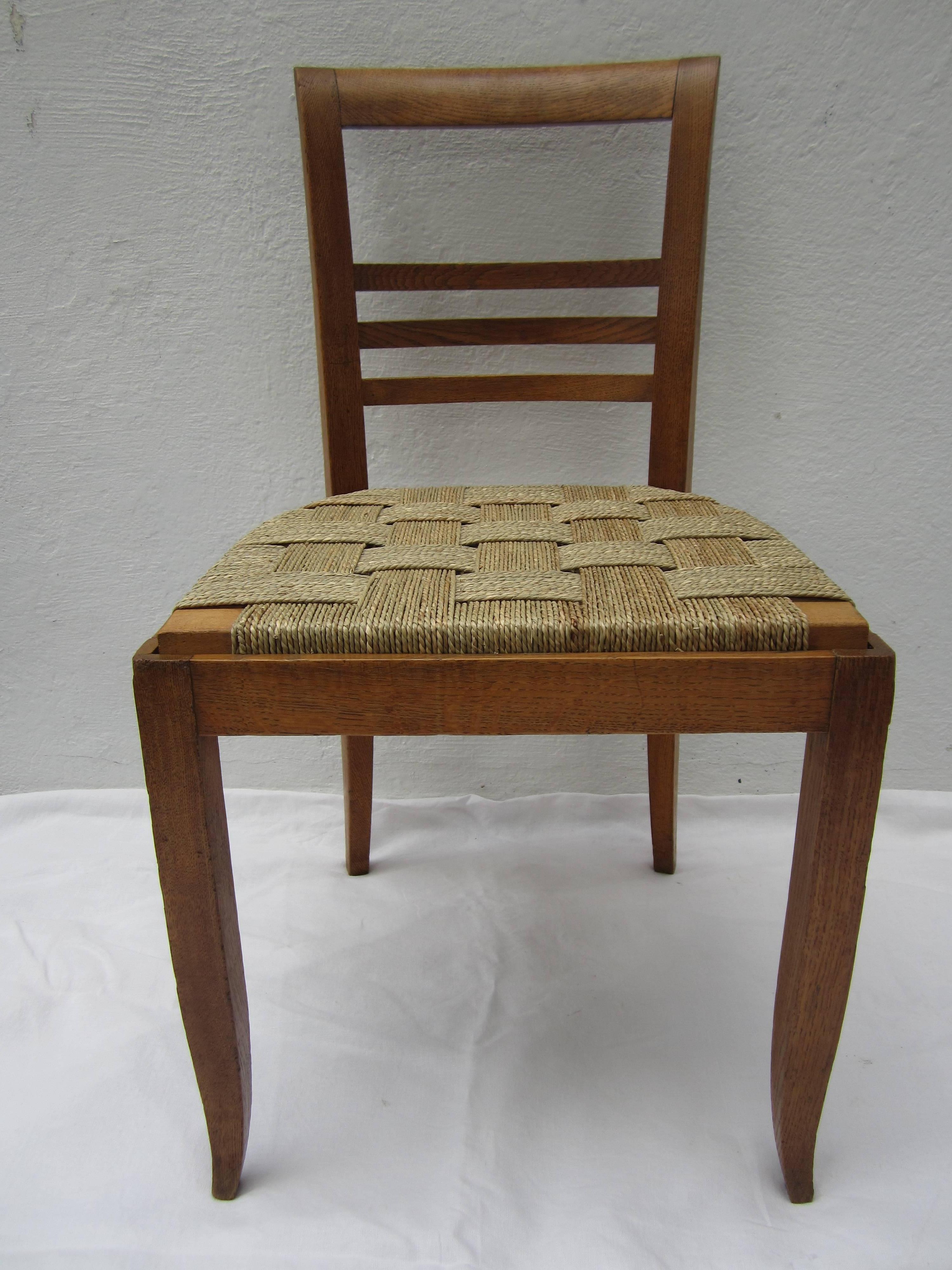 Set of six French oak chairs with basket woven seagrass seats (newly refurbished.)