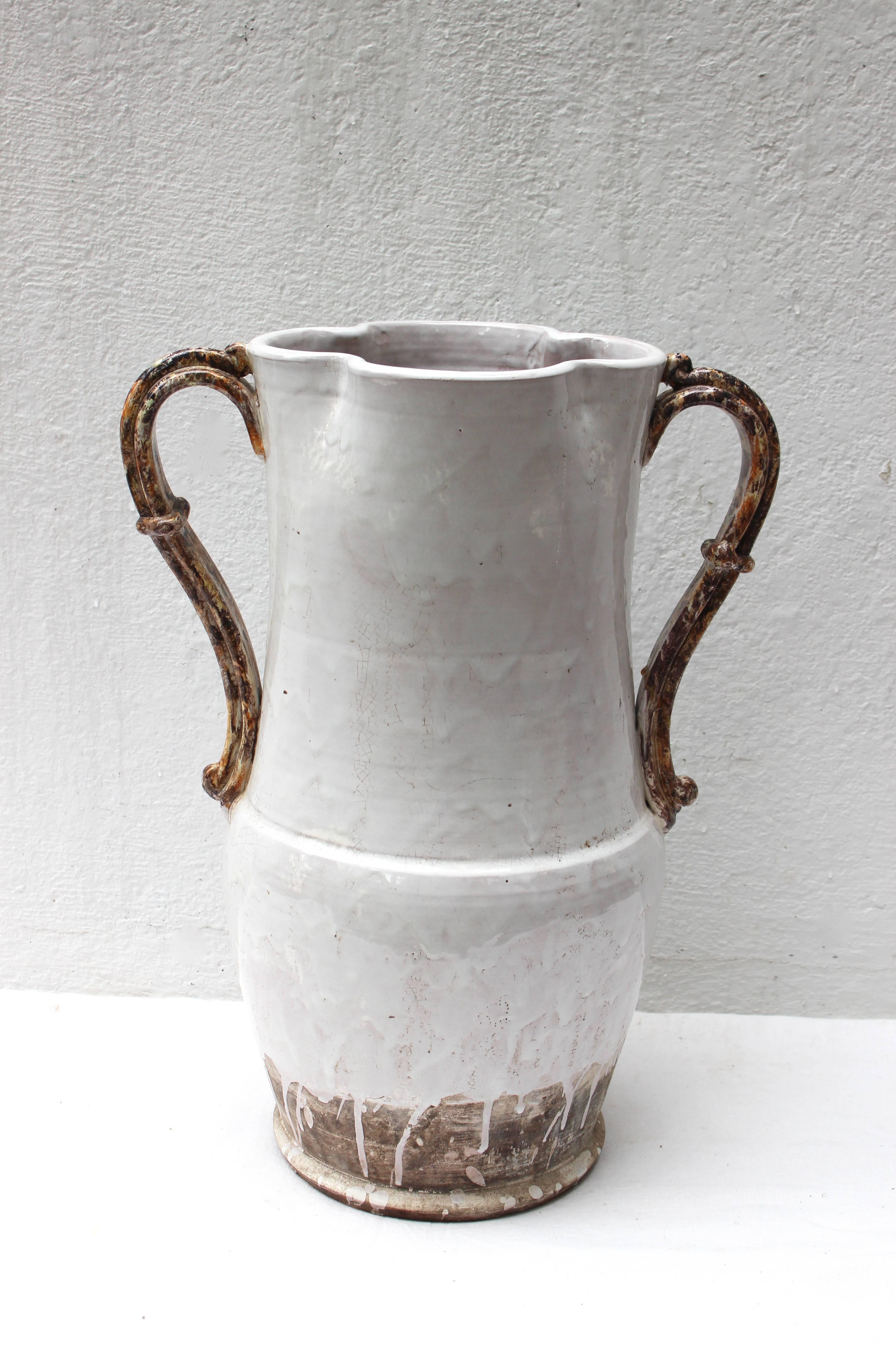 Wonderful looking large vase with handles and beautiful glaze, large enough for use as an umbrella stand.