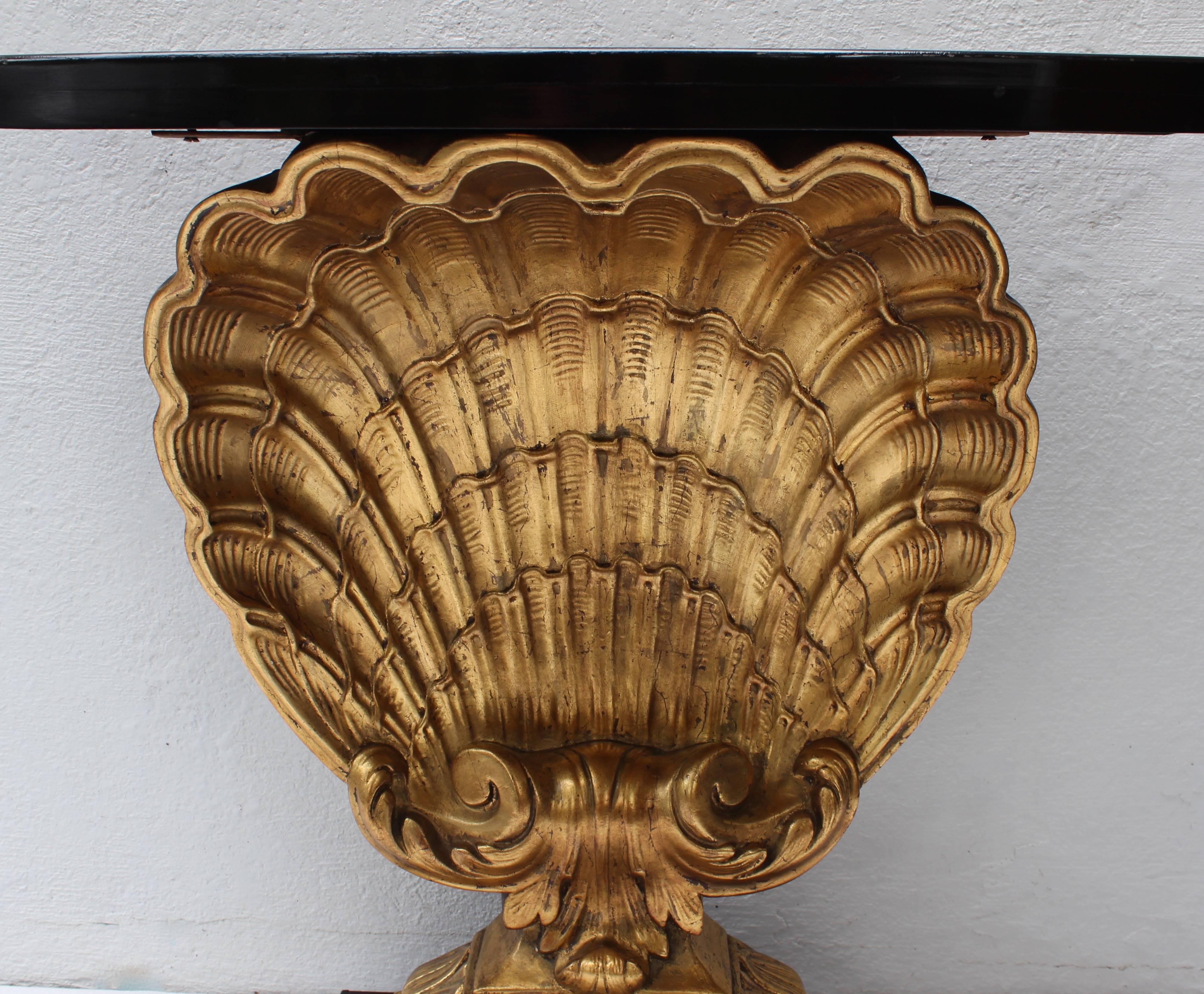 Gorgeous giltwood shell console by Grosfeld House.