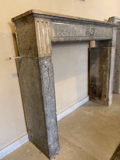 French Fireplace Mantel in Burgundy Stone