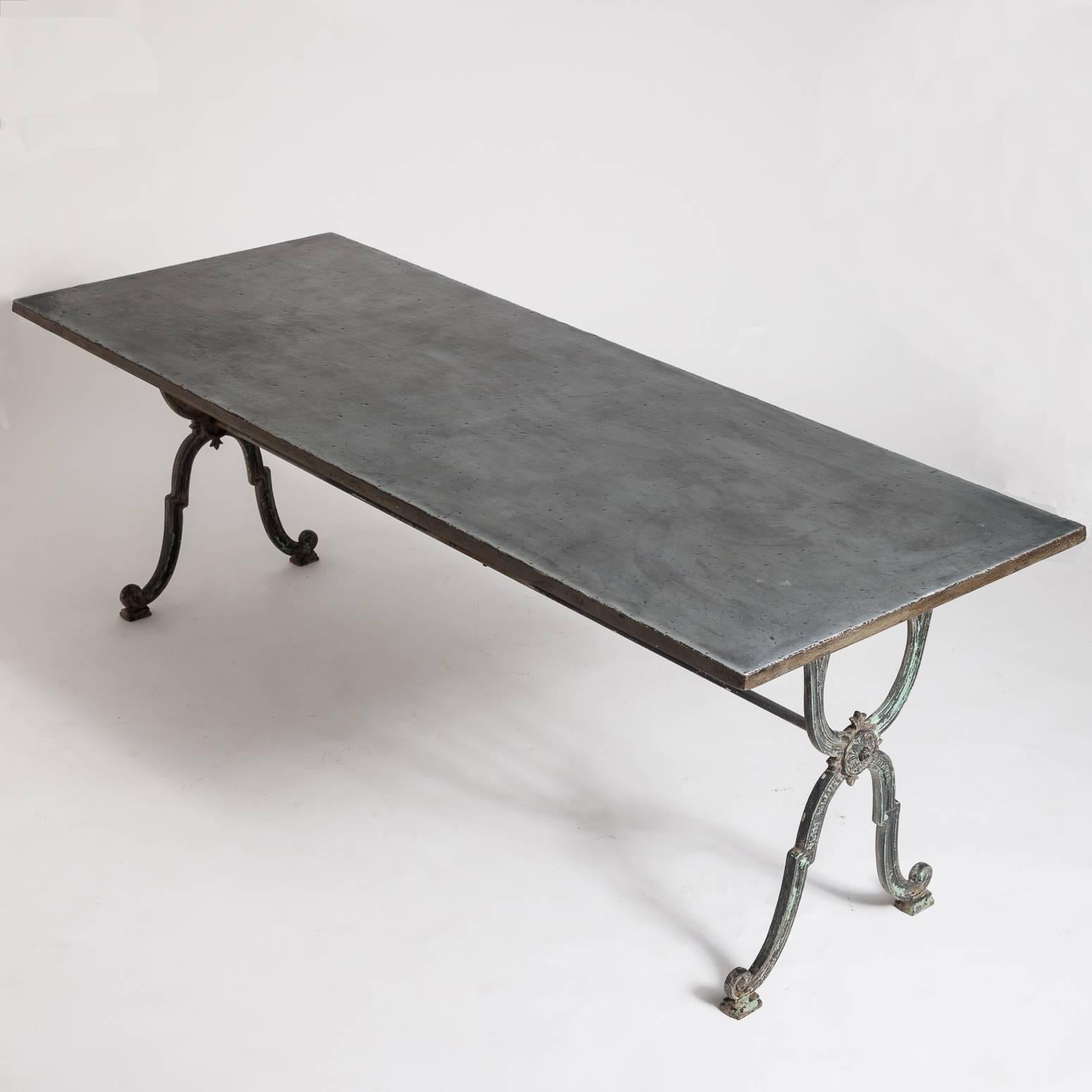 This table from the Provence area has an intricate antique cast iron base marked with the maker’s name, Jean Faraill, Perpignan. Perpignan is a small city in Southwest France, near the Mediterranean coast.  The new wooden top is covered with