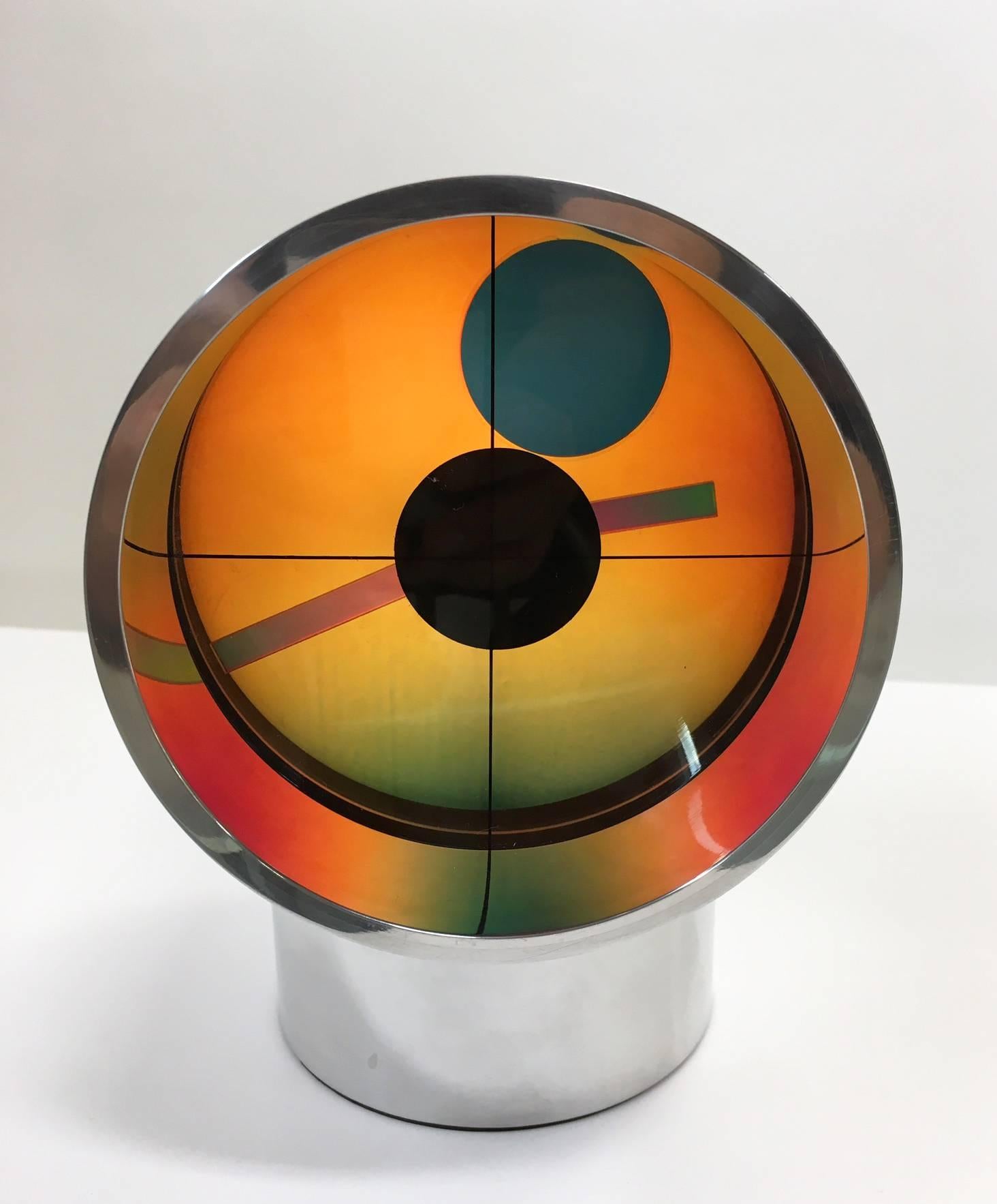 Aurora clock designed by Kirsch or Hamilton Associates with Corchia and de Harak. Serial Number 29785. The Aurora was based on Jordan Kirsch (of Kirsch-Hamilton)'s patent for a clock that used birefractive lenses. They hired the design firm Corchia