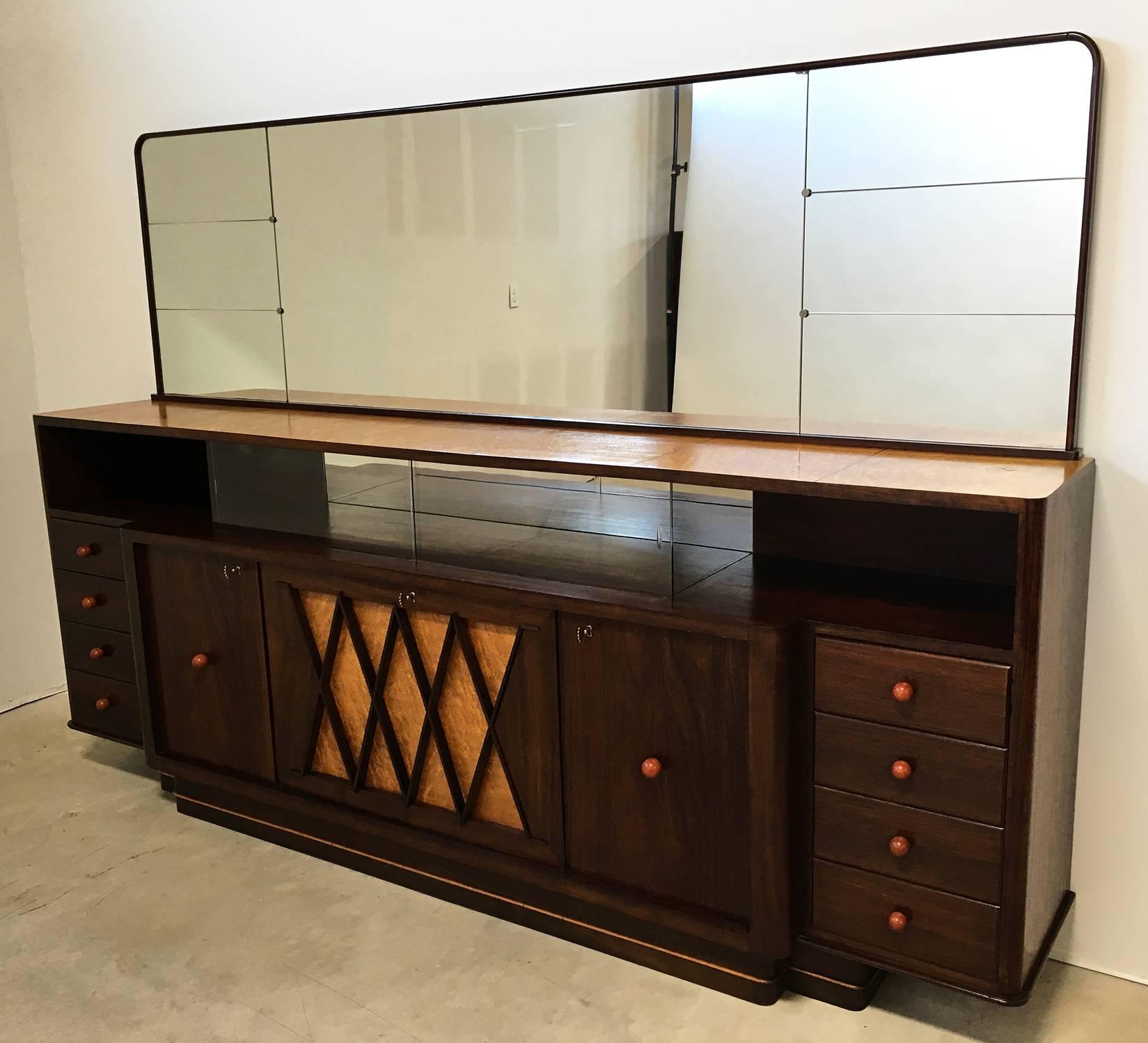 Superb four-door and eight-drawer sideboard cabinet attributed to Osvaldo Borsani of beautiful mahogany, rosewood and burl elm woods. Modernist diamond pattern door inset pattern on front center doors of burl elmwood and rosewood; above is a