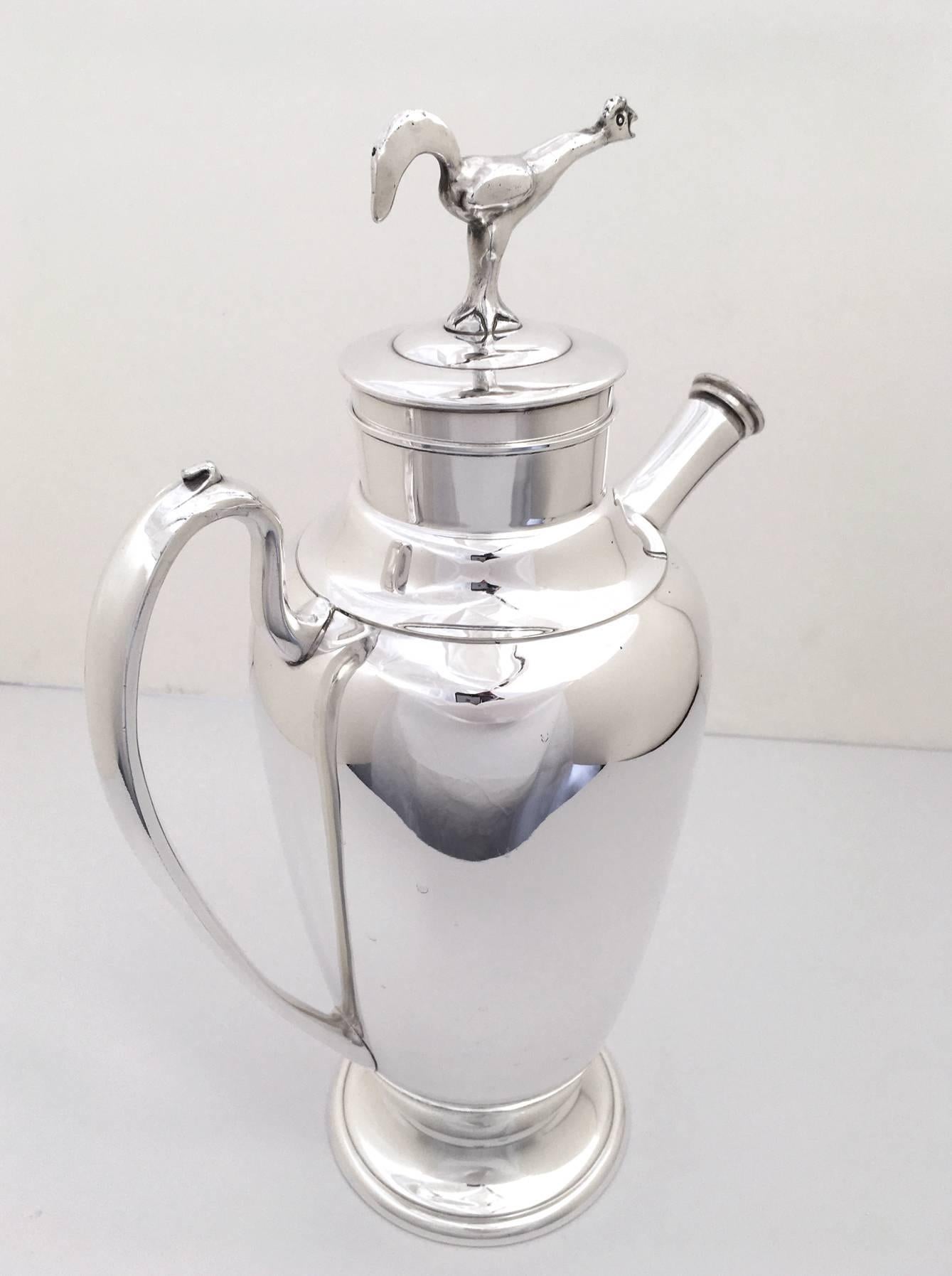 A rare and impressive silver plate cocktail Shaker with a roaring 1920s rooster on top. Apollo Studios of New York was a division of Bernard Rice's and Sons and items marked with the Apollo stamp were made from 1920 to 1922. In 1872, the Apollo