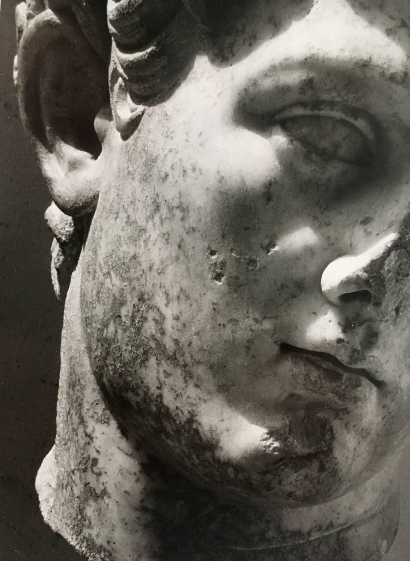 A Herbert List framed gelatin print, a marble sculpture head of a young man at the National Archaeological Museum, Athens Greece 1936. Printed later with estate stamp verso, date and numbered 10/15. This image was removed from the frame to be