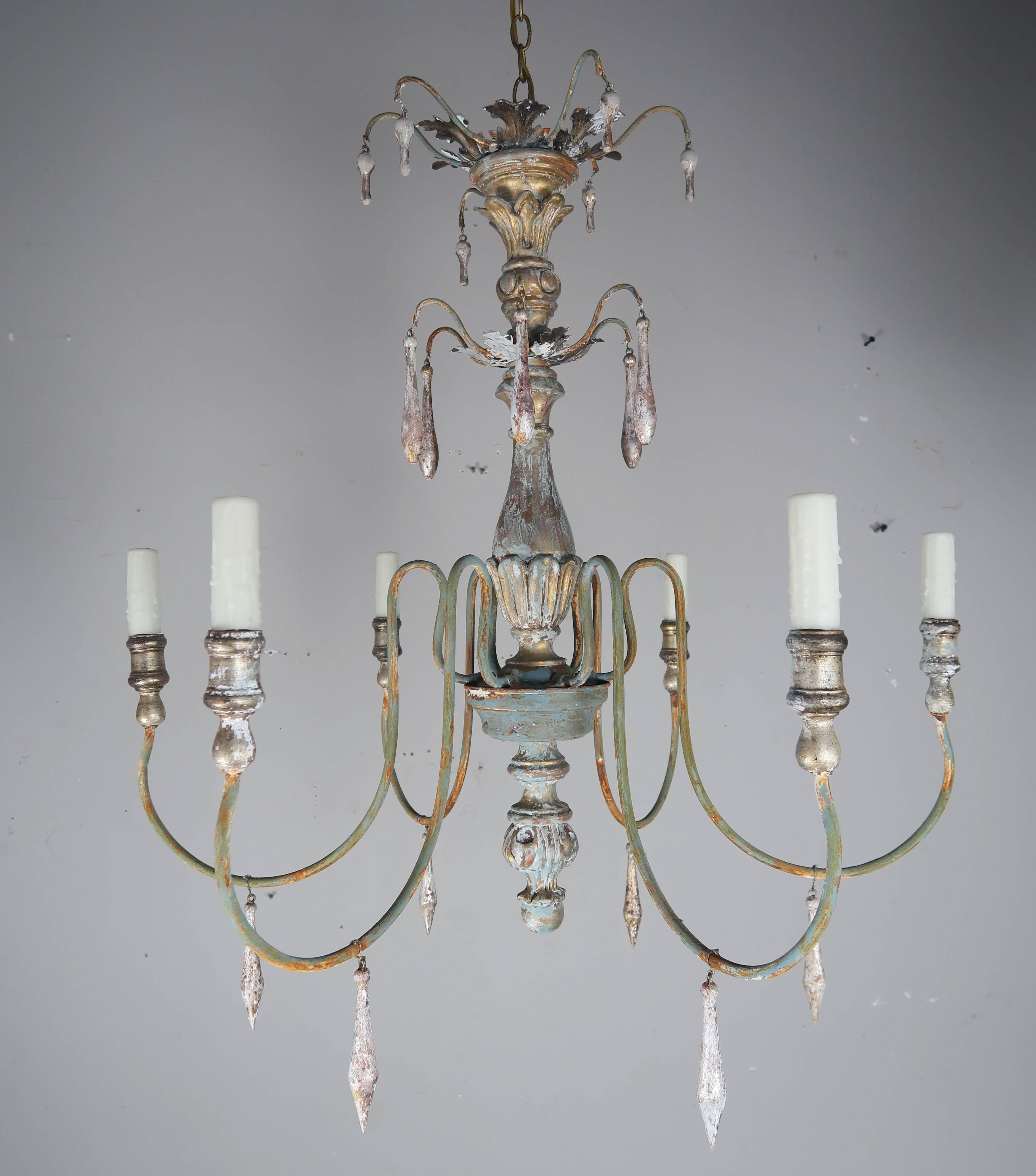 Six-light Italian painted grey wood and metal chandelier with gold and silver highlights throughout. Newly rewired with drip wax candle covers. Includes chain and canopy.