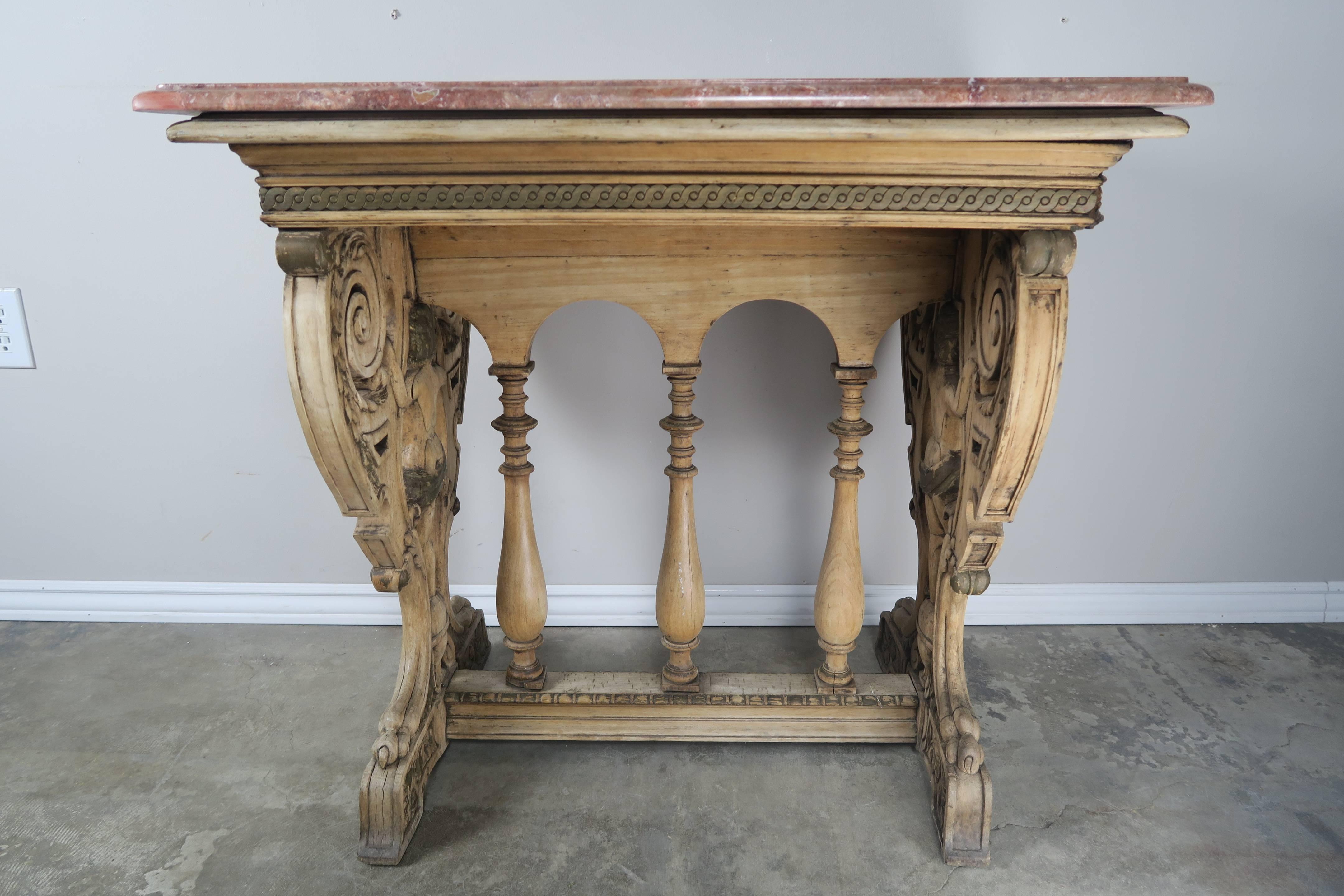 19th Century Carved Italian Walnut Figural Marble-Top Table In Excellent Condition In Los Angeles, CA