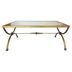 Curule Gilt Iron Coffee Table with Antiqued Mirror Top by Miamar Home