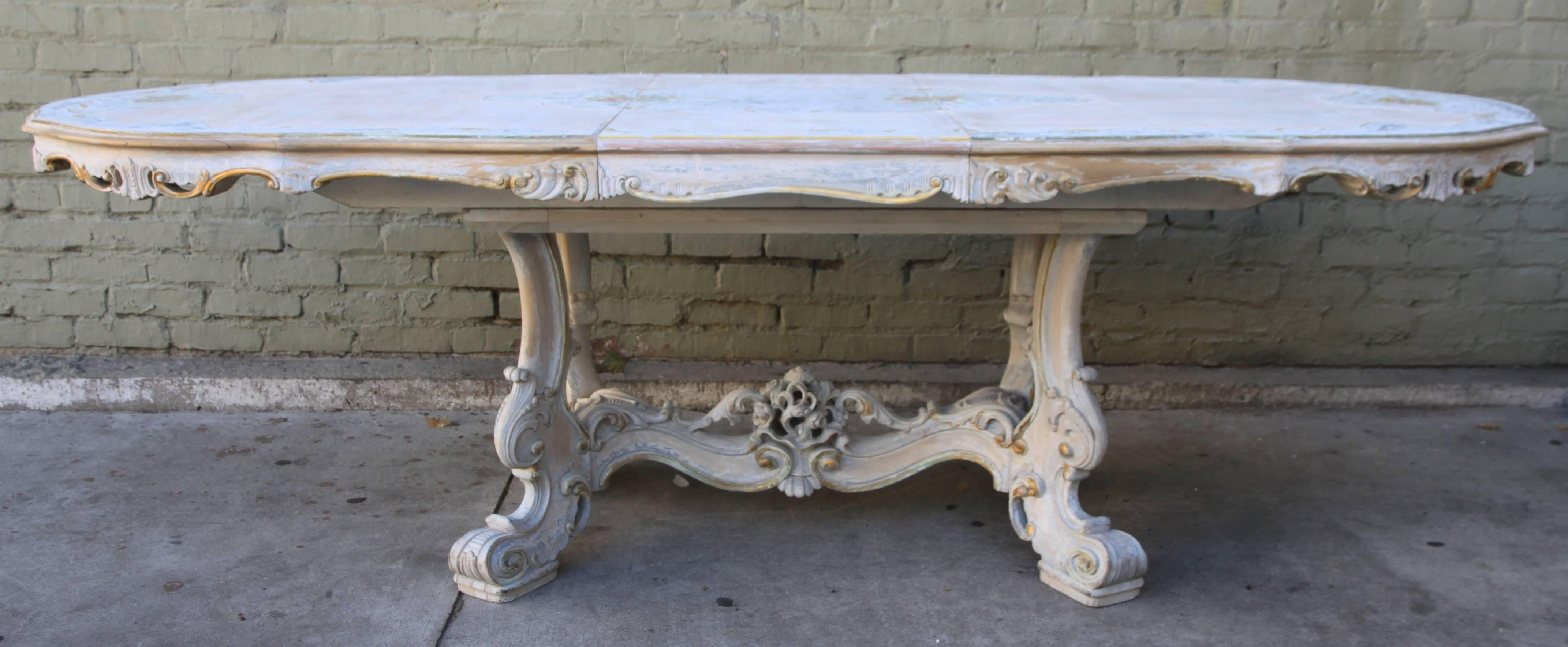 French 1930's painted Rococo style dining table with center leaf.