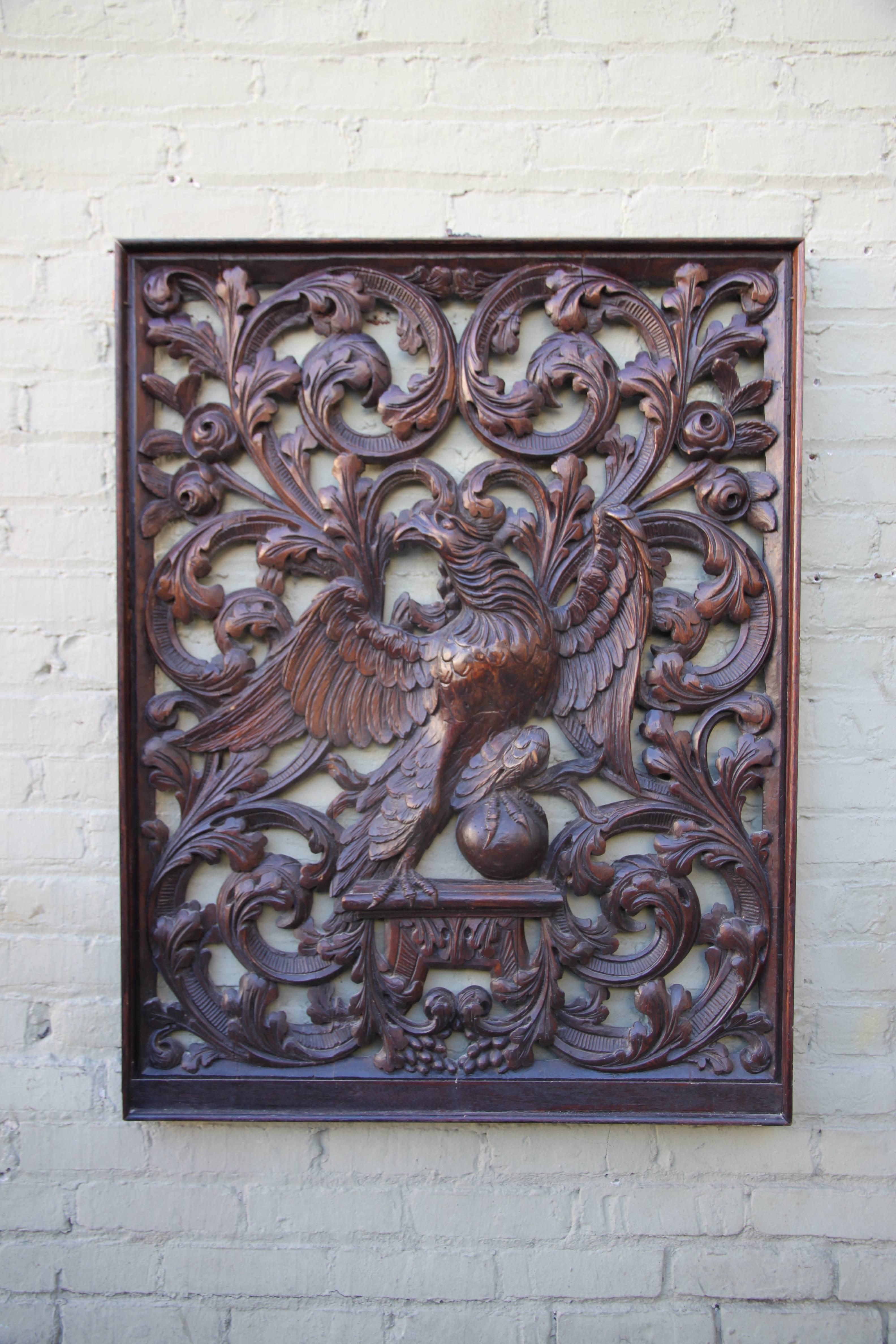 Pair of 19th century hand-carved walnut panels with Eagles and scrolled acanthus leaves throughout.