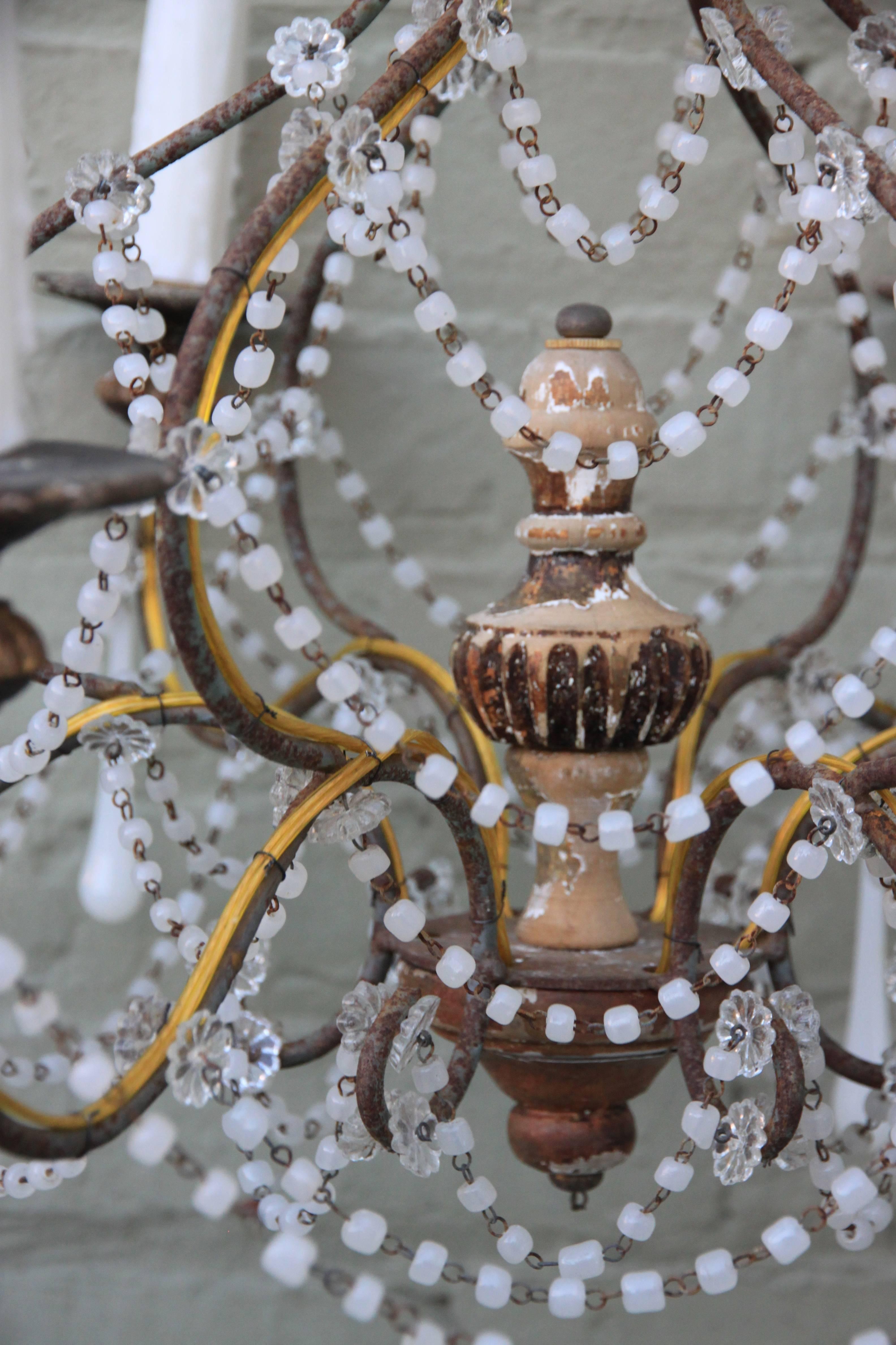 Six-light white opaline beaded chandelier with white opaline drops throughout. Newly rewired and in working condition with new chain and canopy included.