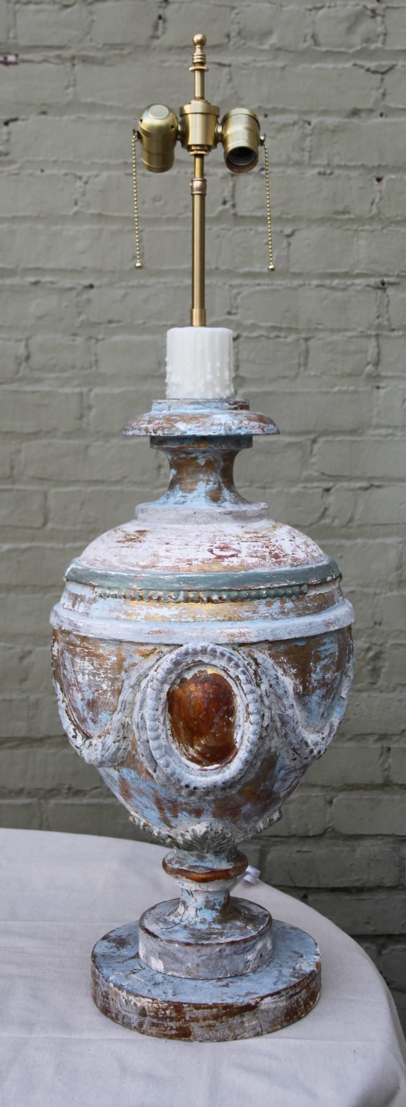 Pair of 19th century Italian urns wired into lamps and crowned with custom-made hand-painted parchment shades. Shade size: 12.5
