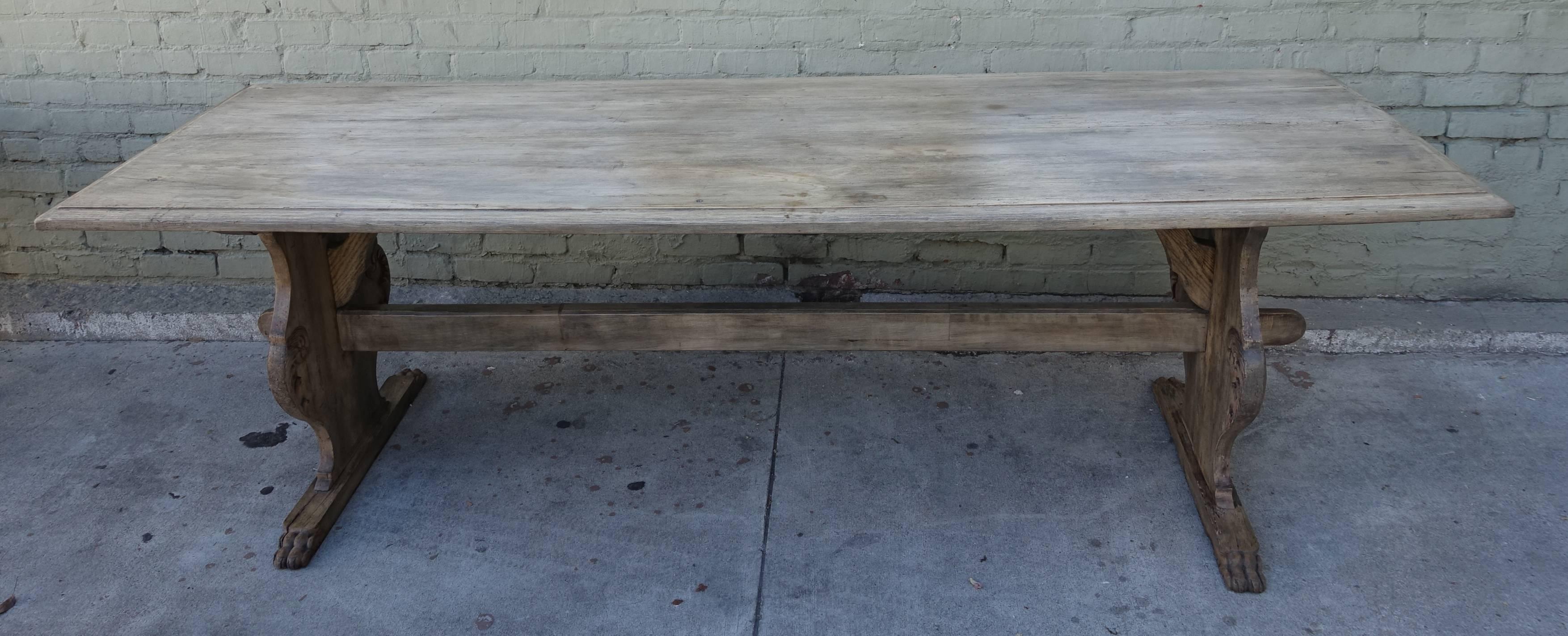 19th century Italian trestle table with a center stretcher connecting both ends. Beautiful washed finish.