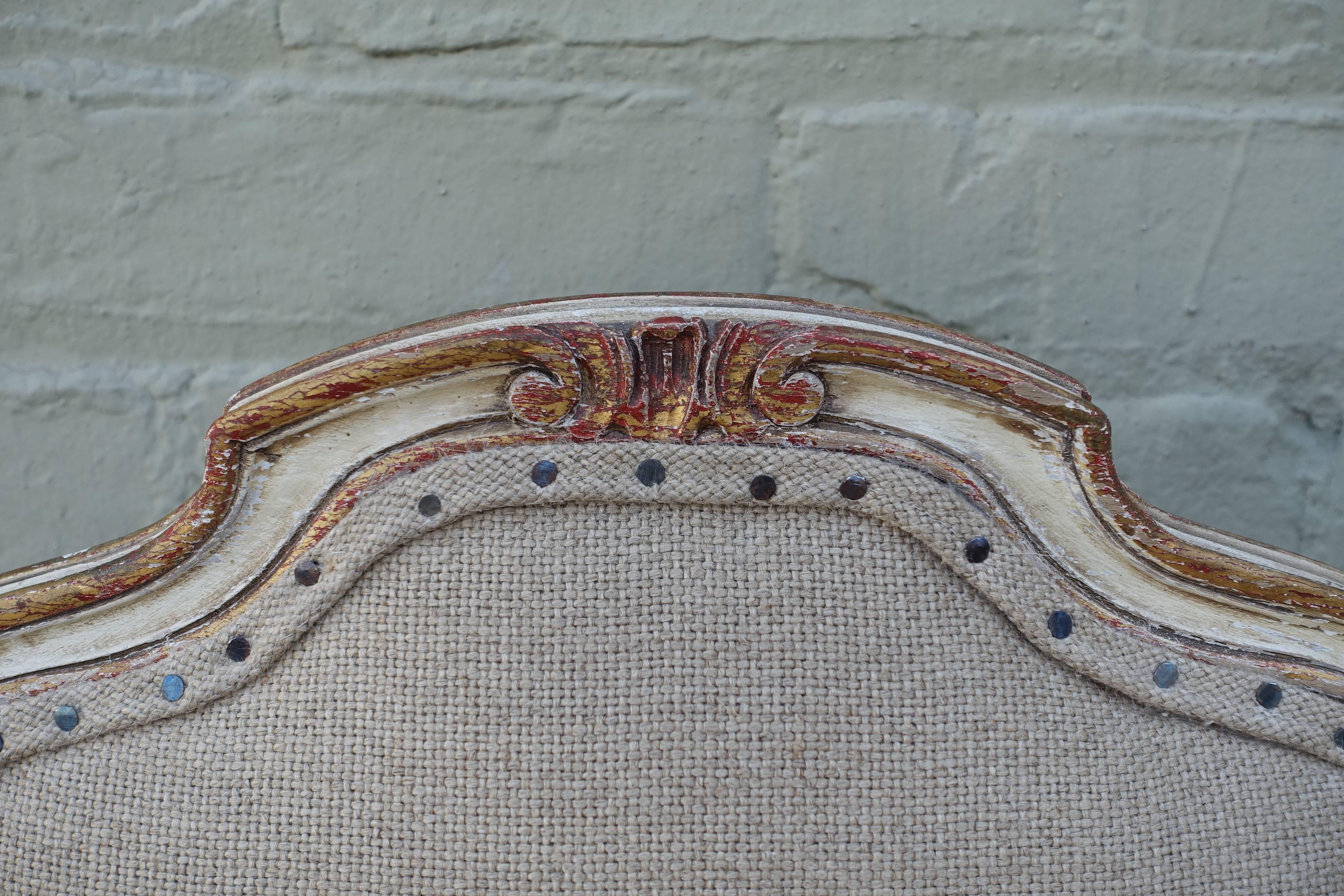 Set of ten French Louis XV style painted armchairs newly upholstered in Belgium linen with spaced nailhead trim detail.