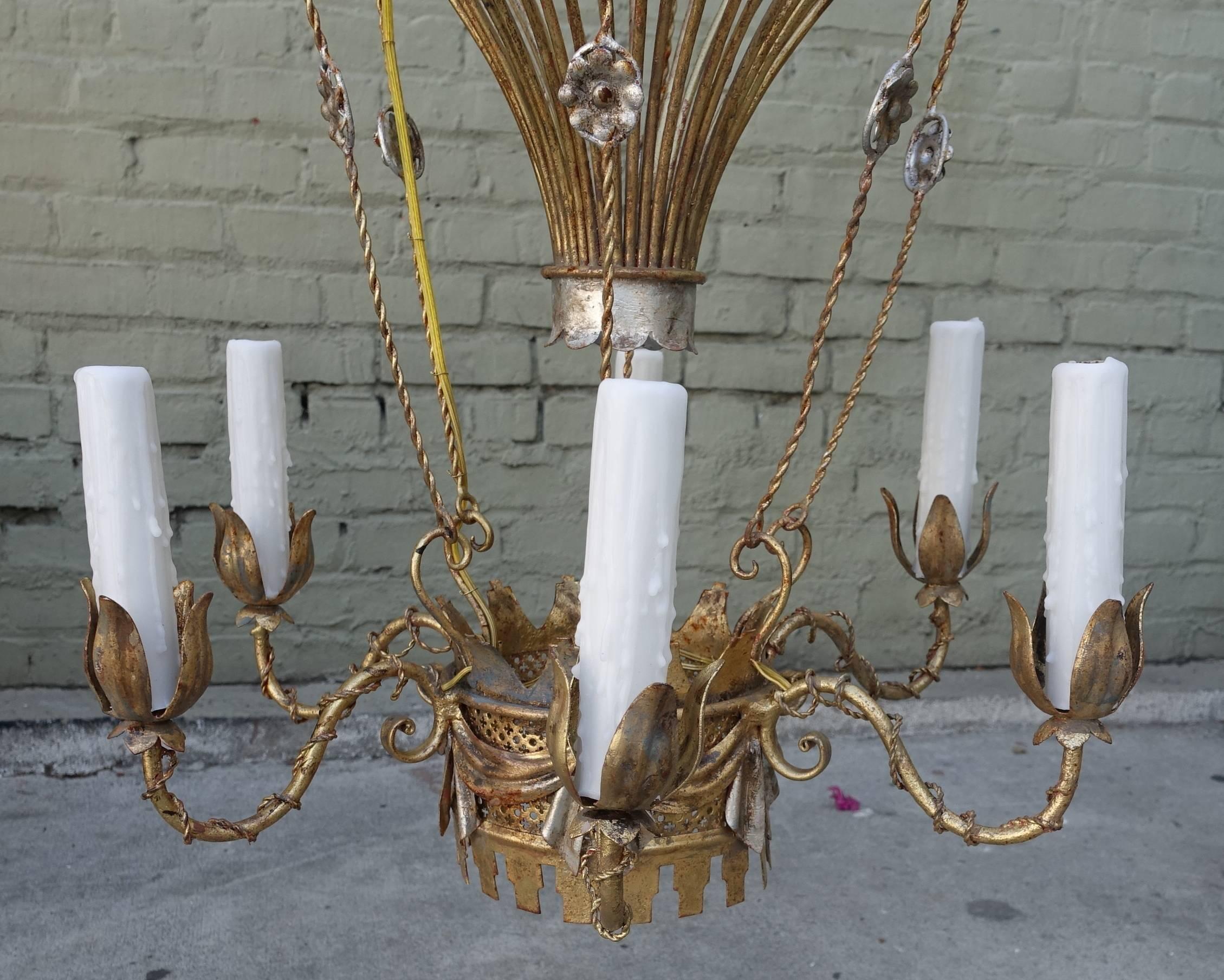 Six-light Italian gold and silver metal balloon chandelier with drip wax candle covers. Newly rewired and in working condition. Chain and canopy included.
