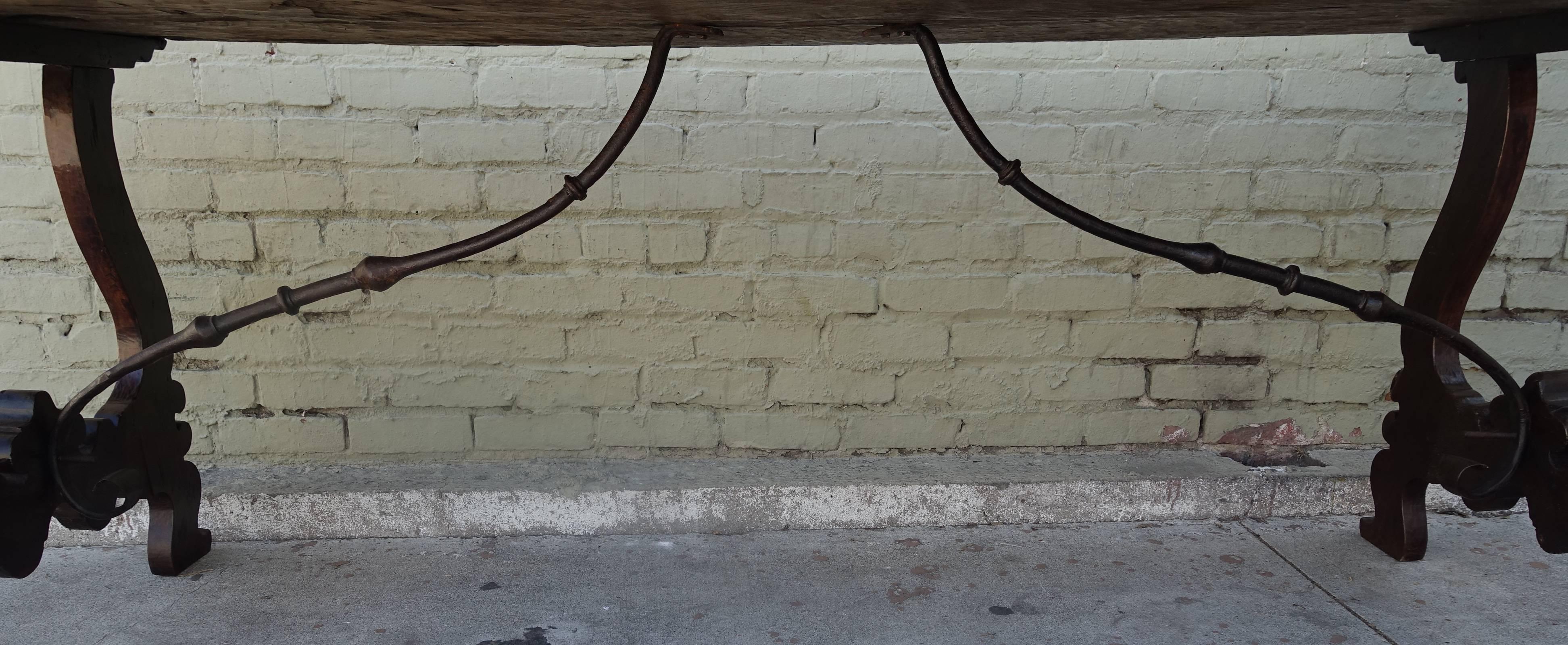 Italian Walnut Dining Table with Iron Stretcher In Distressed Condition In Los Angeles, CA