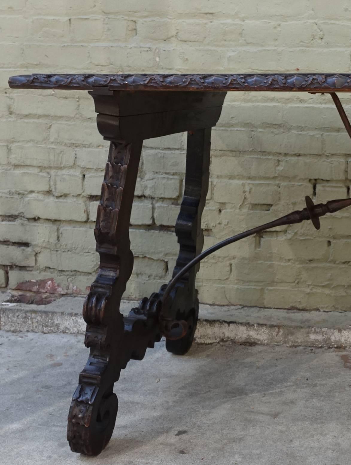 19th Century Spanish Walnut Table with Iron Stretcher In Distressed Condition In Los Angeles, CA