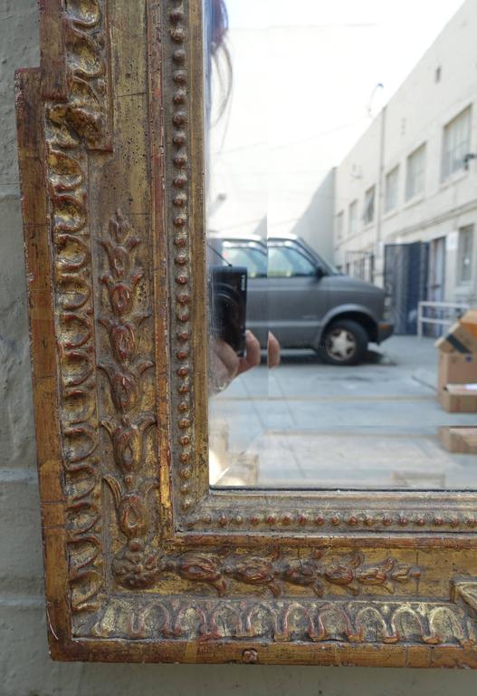 Italian carved 22-karat giltwood mirror with measures 1 1/2