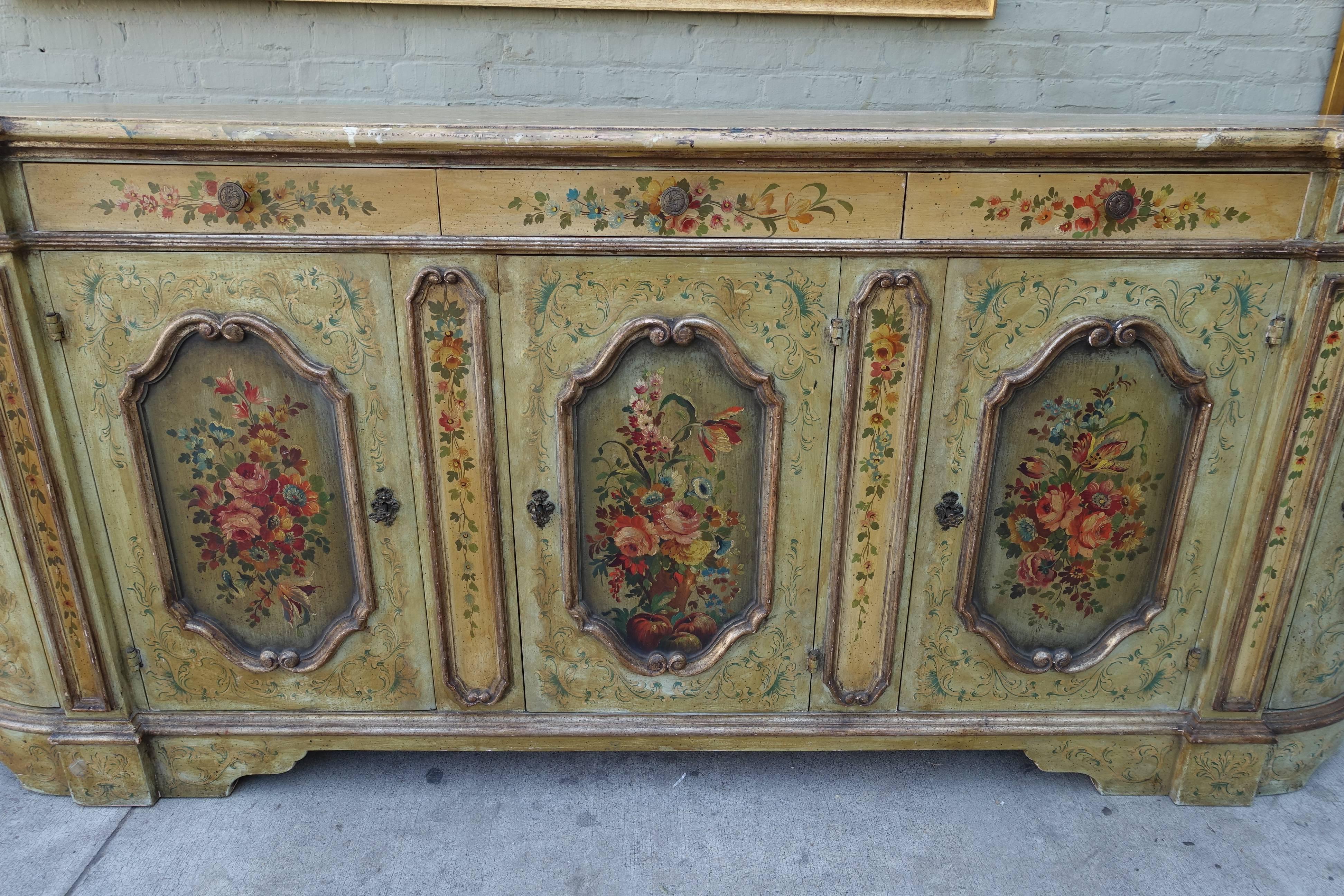 19th century Venetian painted credenza with faux marble top. Great storage with five doors and three drawers. Original metal hardware with working keys.