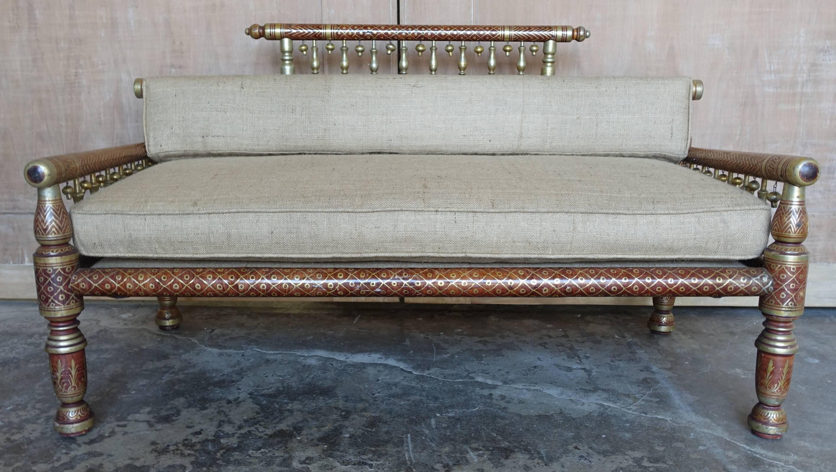 Moroccan wood settee with hand-painted and silver gilt details. Loose burlap cushion with self-welt detail. Long burlap bolster is also included for additional comfort. I have the matching chairs in another listing if you would like a three-piece