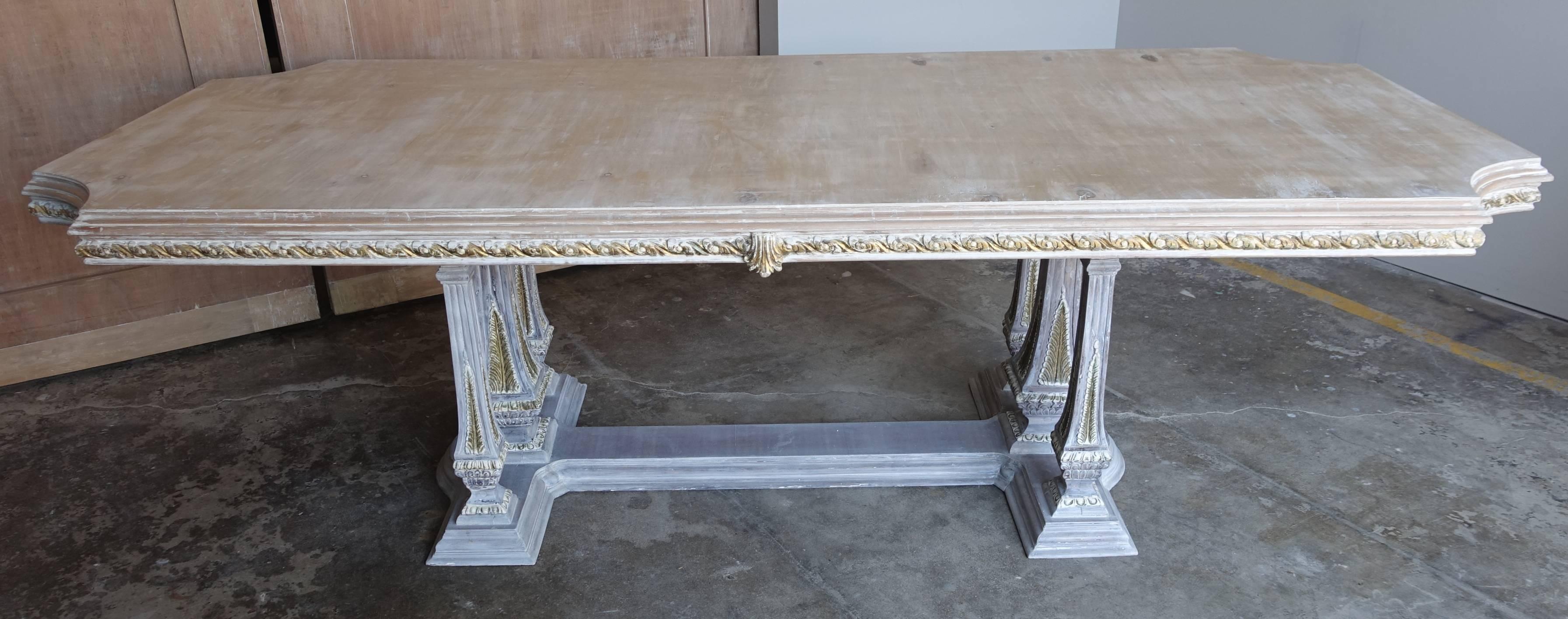 Italian wood painted and parcel-gilt neoclassical style dining table, circa 1940.