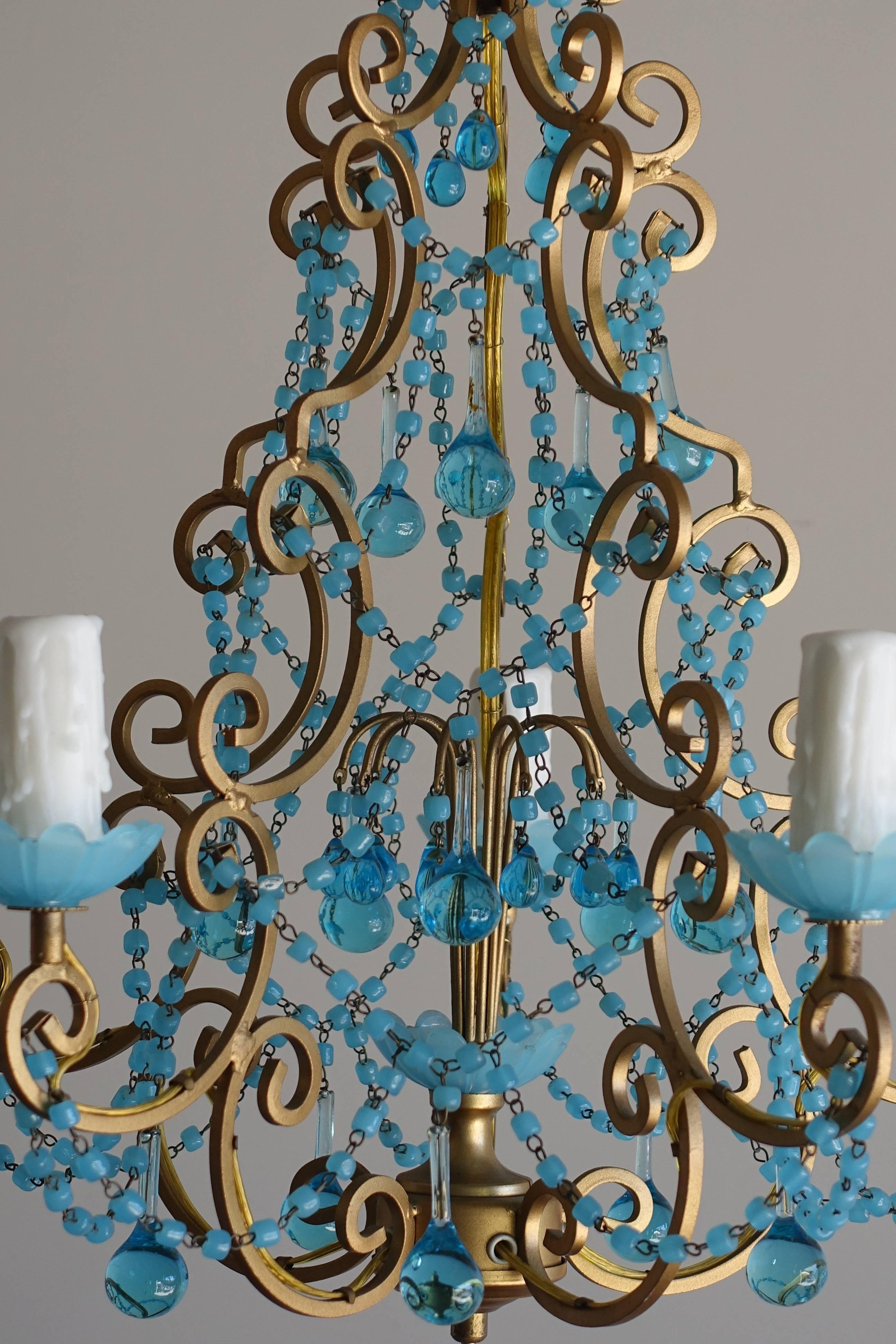 French five-light aqua blue macaroni beaded gilt metal chandelier with blue glass bobeches and drip wax candle covers. Newly rewired and ready to install with chain and canopy included.