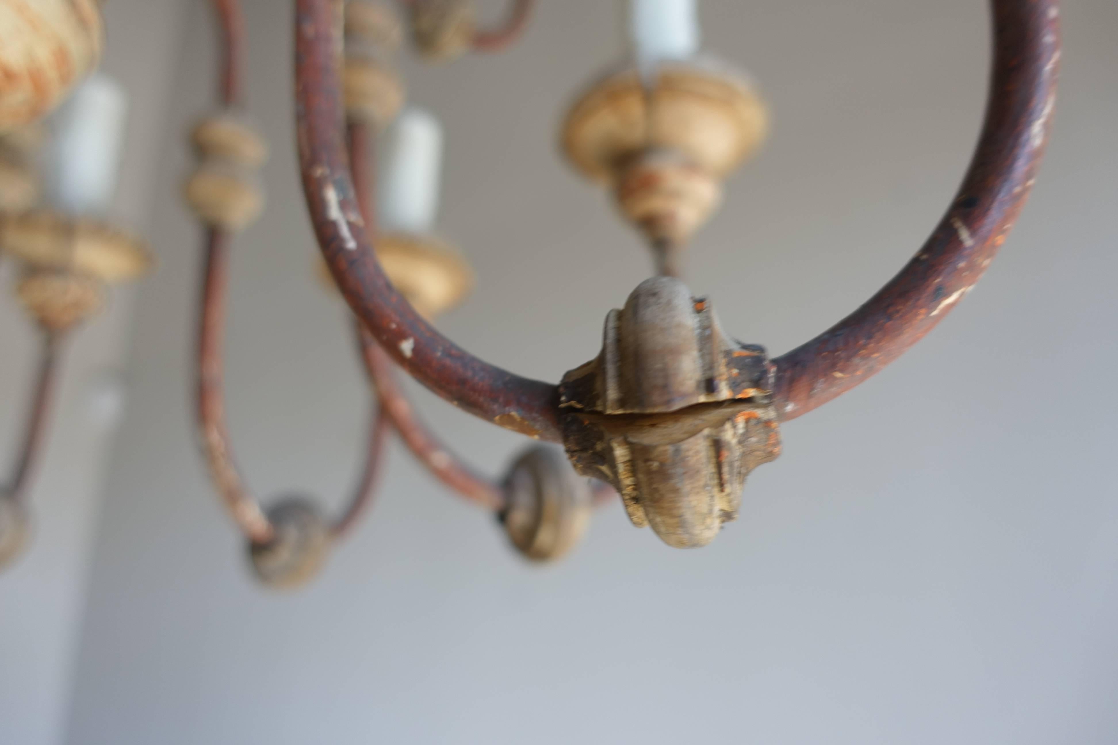 Twelve-Light Italian Wood and Iron Painted Chandelier In Distressed Condition In Los Angeles, CA