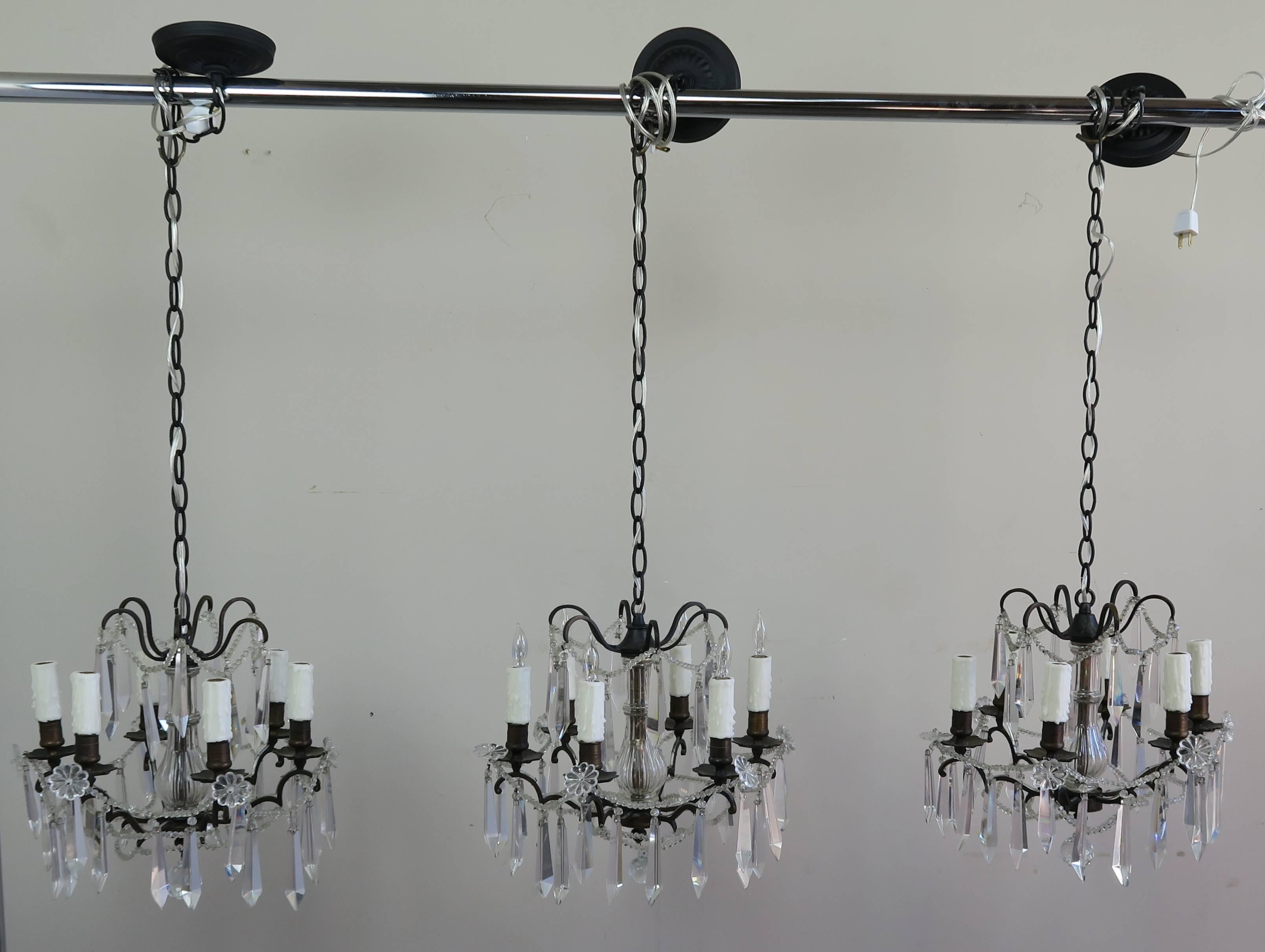 Bronze Pair of French Crystal Chandeliers, circa 1930