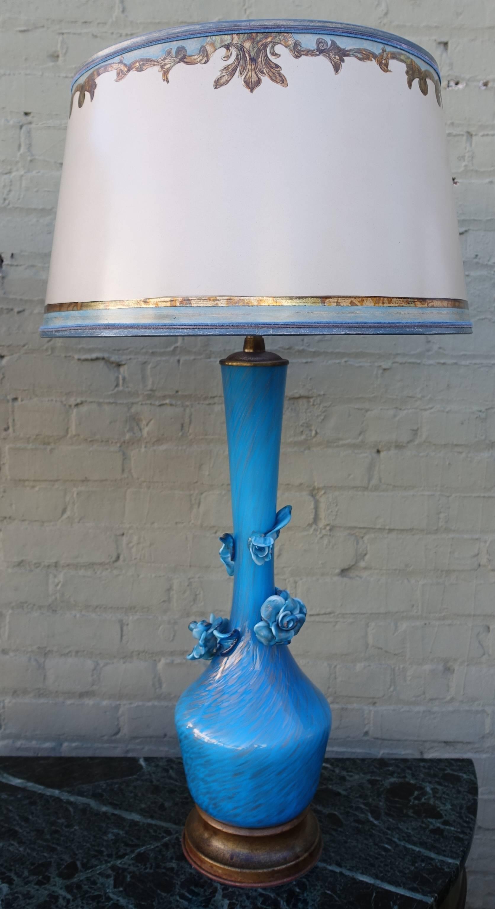 Pair of handblown Italian Murano turquoise colored lamps with gold flecks and detailed glass roses. The lamps are crowned with custom hand-painted parchment shades and stand on metal bases. Shade size: 16