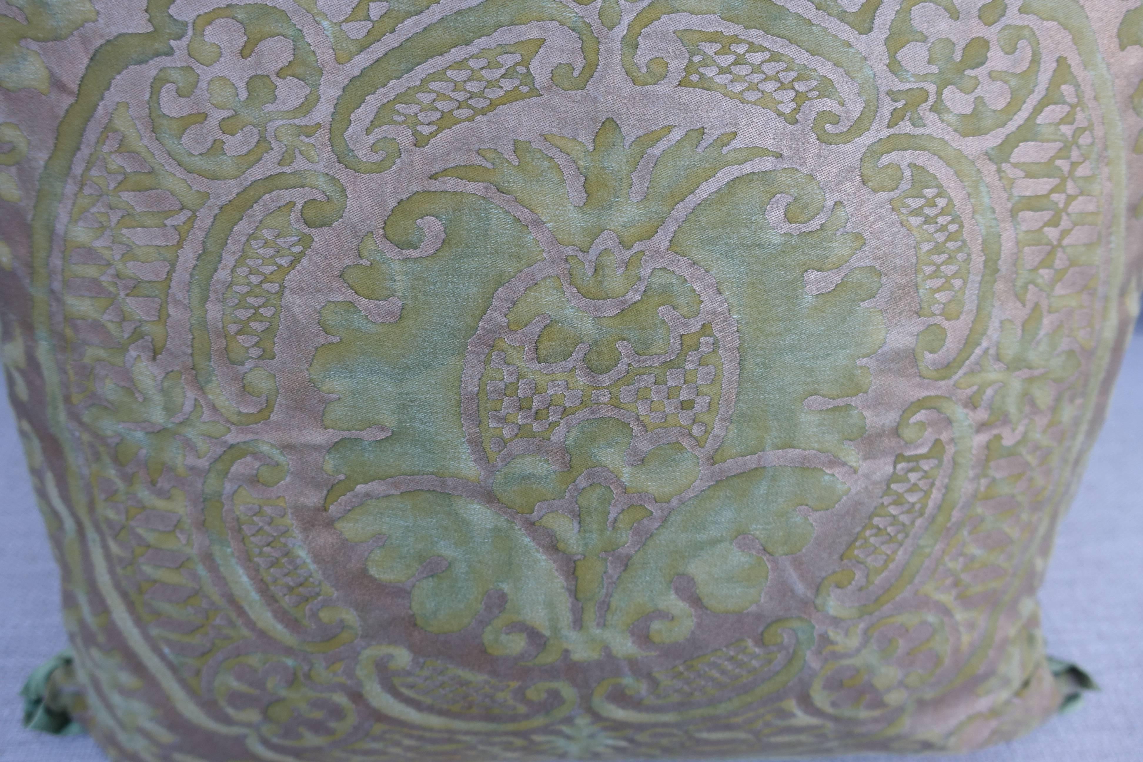 Pair of custom pillows made with Fortuny Orsini patterned soft green and silvery gold textile. Green silk backs with self-welt detail. Zipper closures.