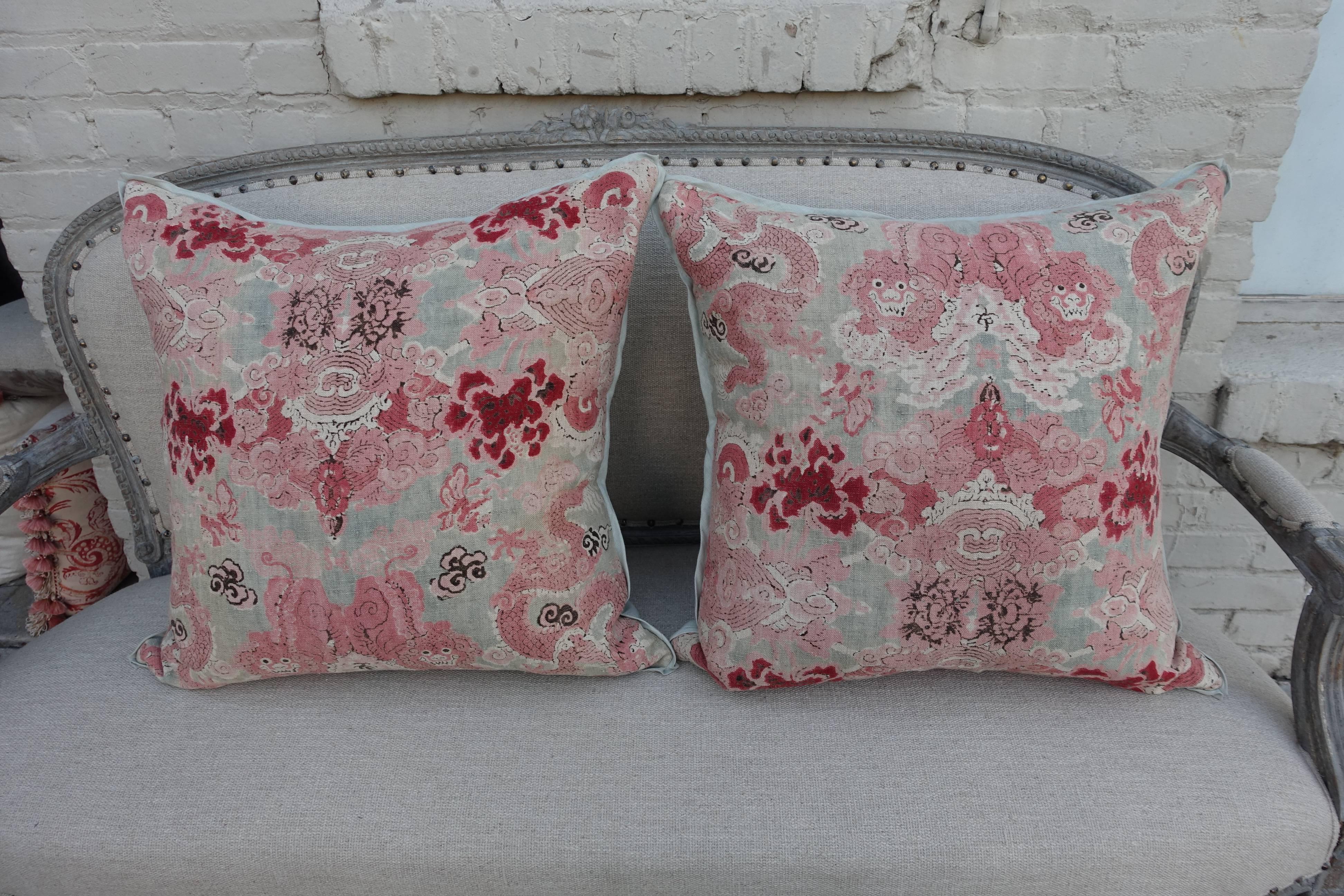 Pair of custom pillows made with vintage printed chinioserie cotton fabric. Breeze colored linen backs with self welt detail. Down inserts.