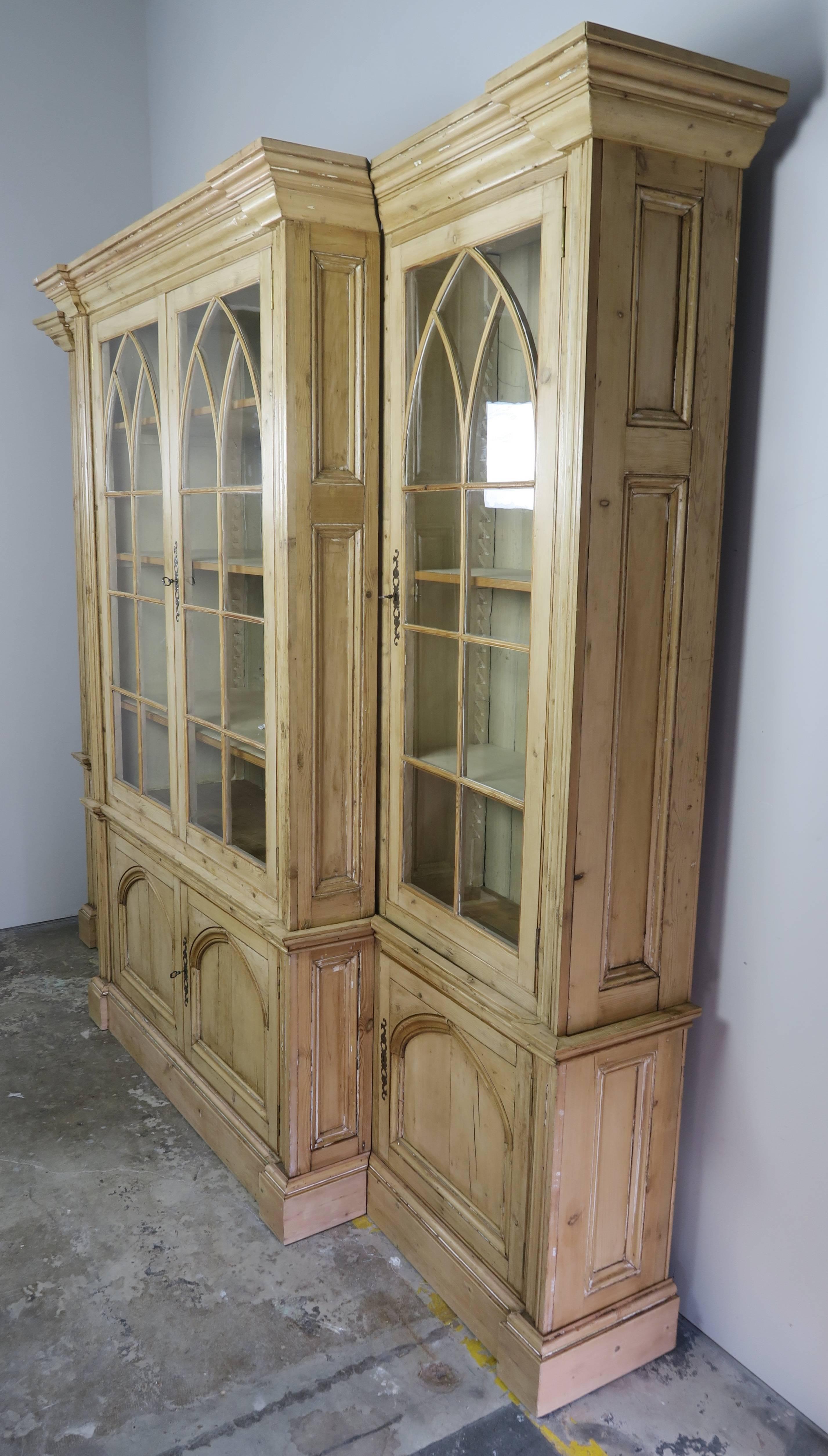 19th century English pine three part bookcase with original glass and natural wood finish.