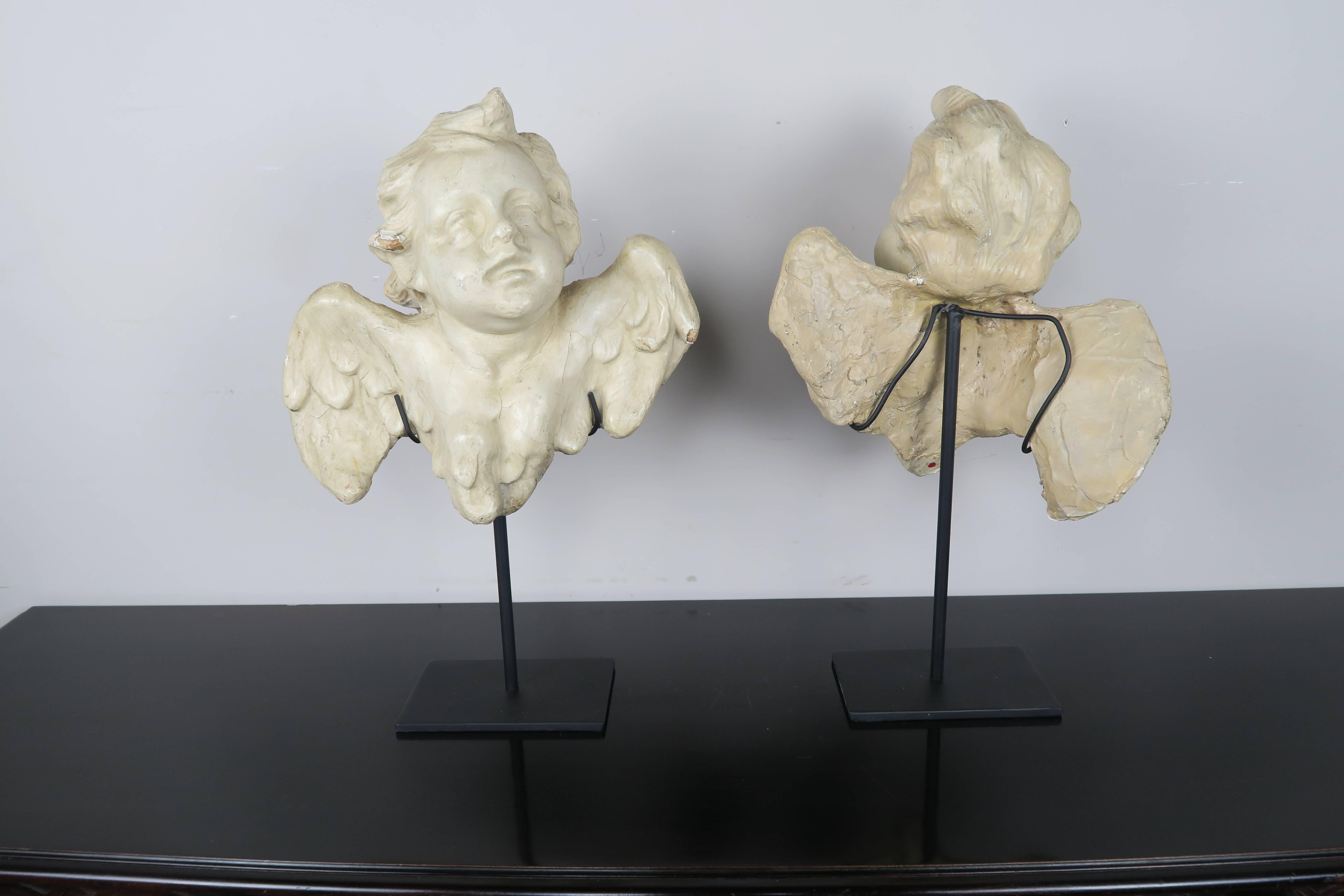 Pair of Papier Mâché Cherubs on Iron Bases In Distressed Condition In Los Angeles, CA