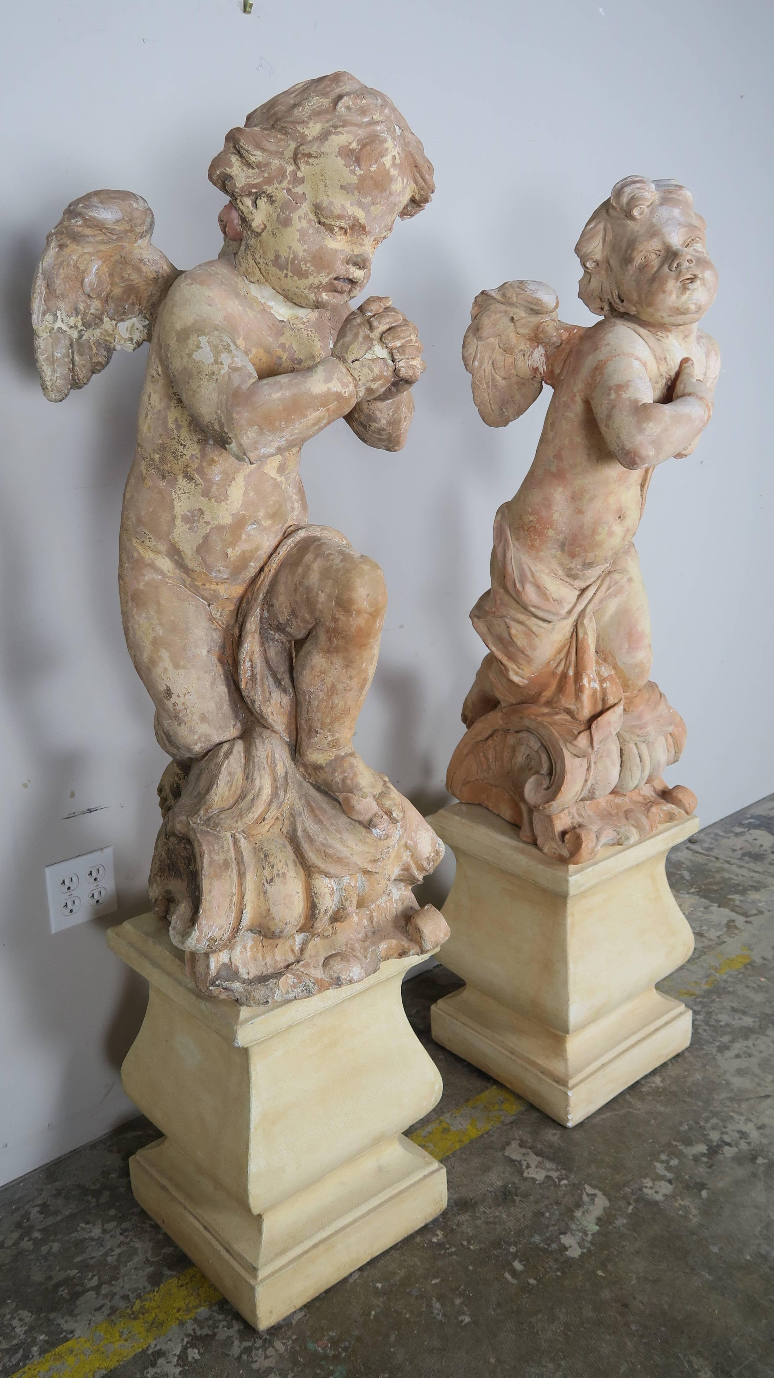 Pair of 18th Century Terra Cotta Cherubs by Claude Clodion In Distressed Condition In Los Angeles, CA
