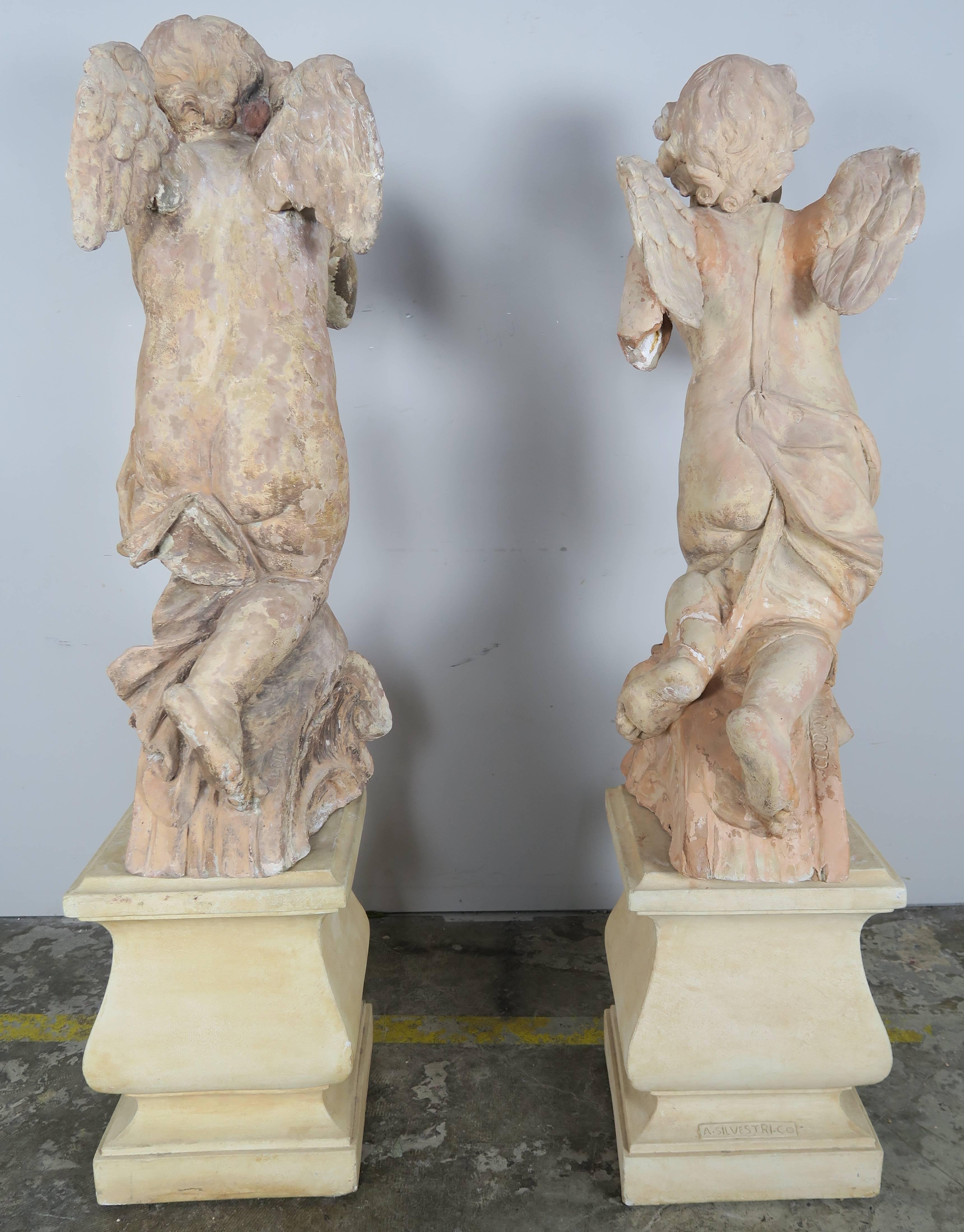 Pair of 18th Century Terra Cotta Cherubs by Claude Clodion 1