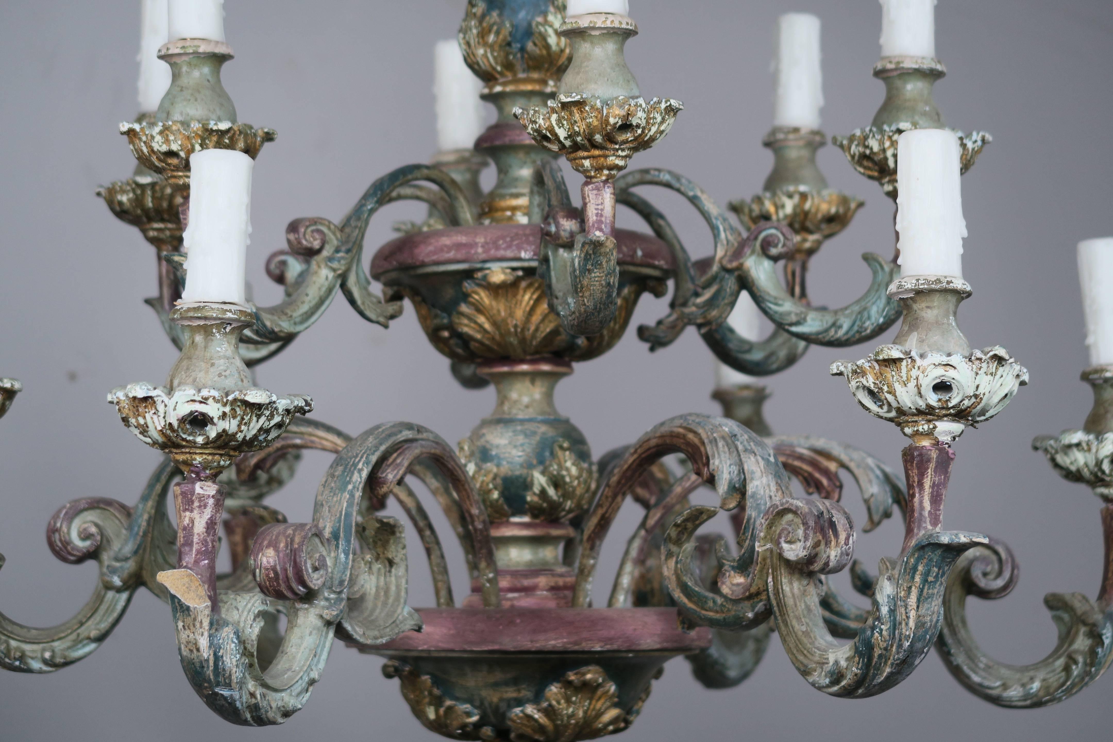Twelve-light Italian painted two-tier chandelier newly rewired with drip wax candle covers. Includes chain and canopy.