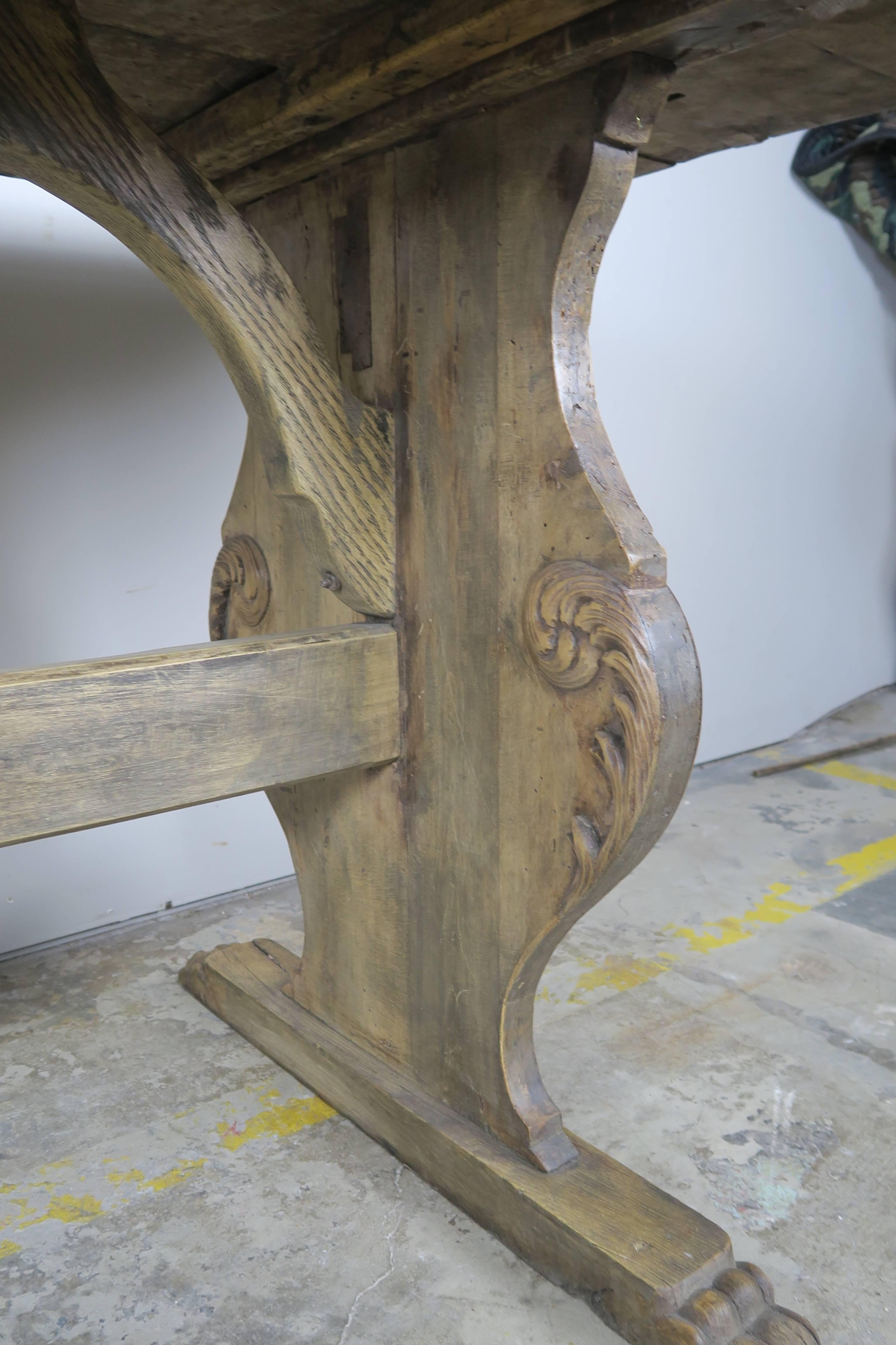 19th Century Italian Carved Wood Trestle Table In Distressed Condition In Los Angeles, CA