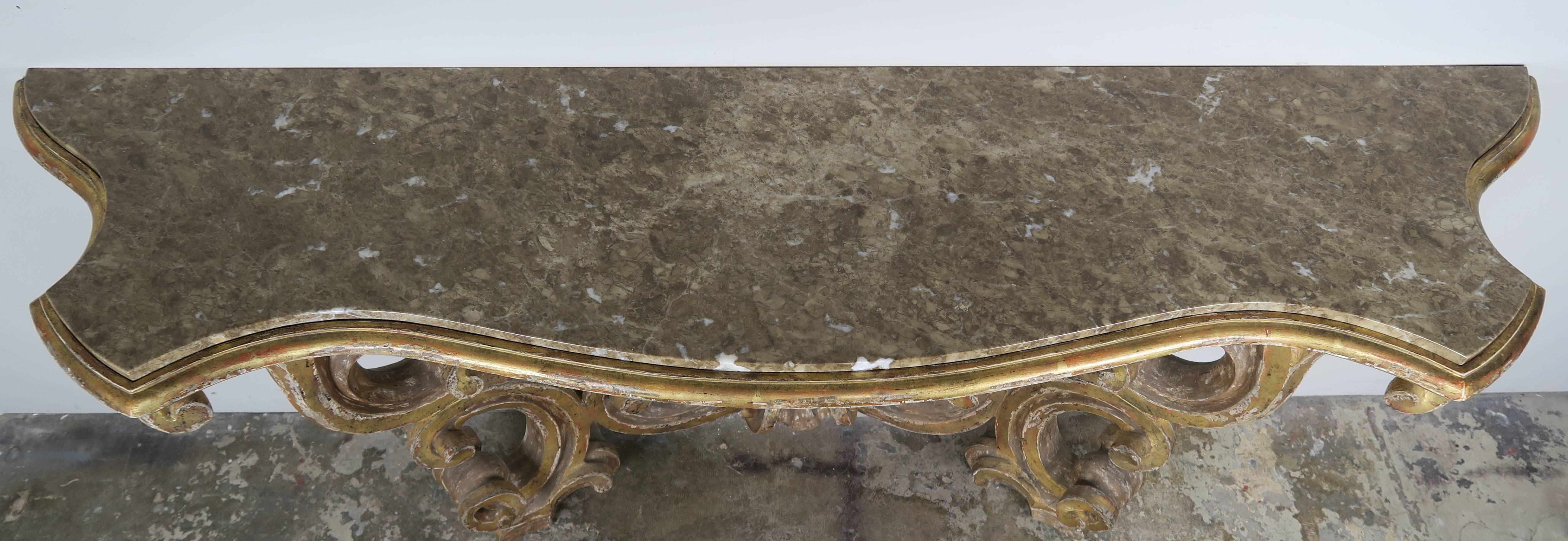 Italian Giltwood Consoles with Marble Top In Distressed Condition In Los Angeles, CA
