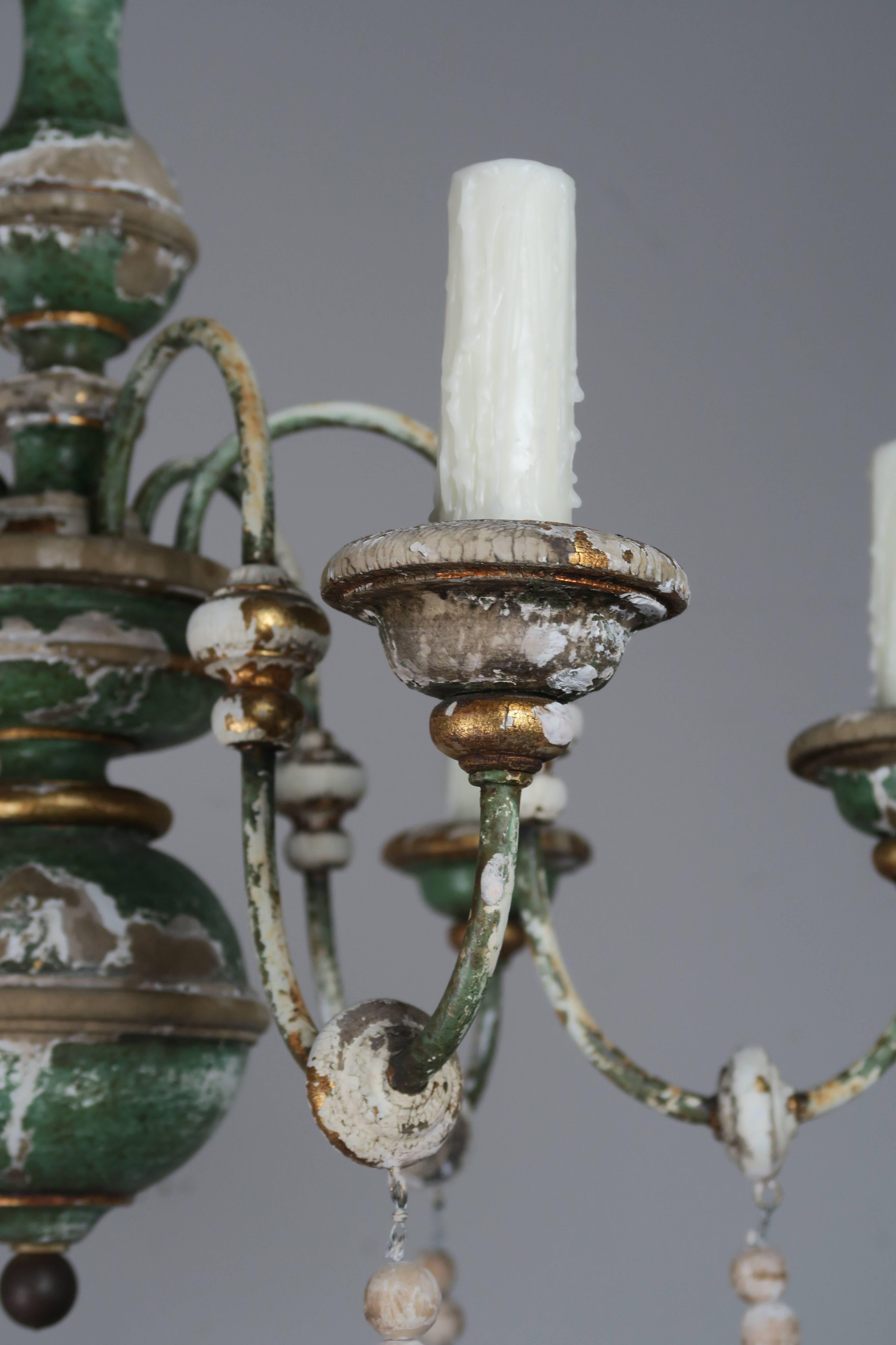 Italian Painted and Parcel-Gilt Chandelier with Wood Drops In Distressed Condition In Los Angeles, CA