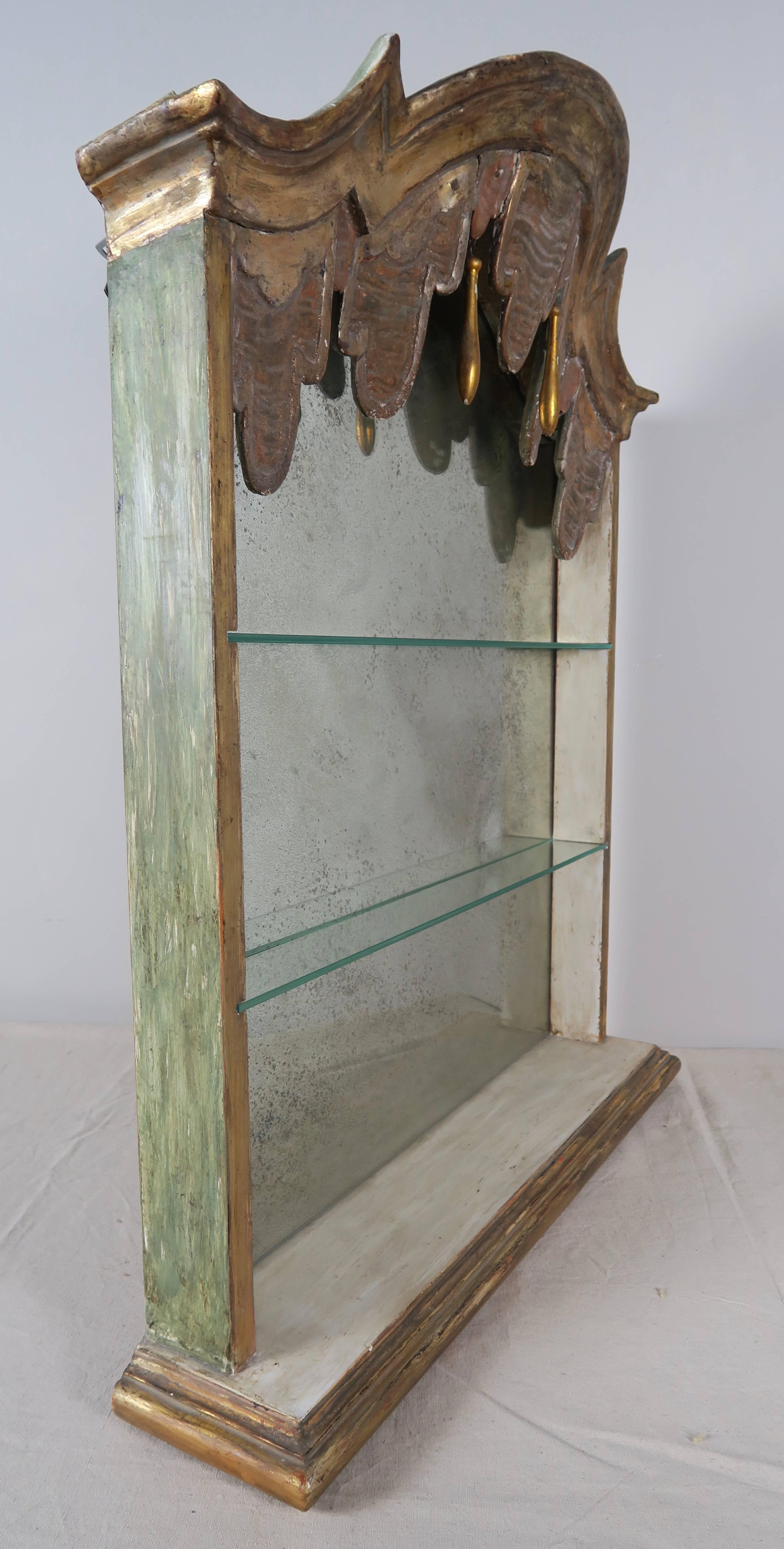 Antique mirrored Italian petite wall cabinet made from antique elements.