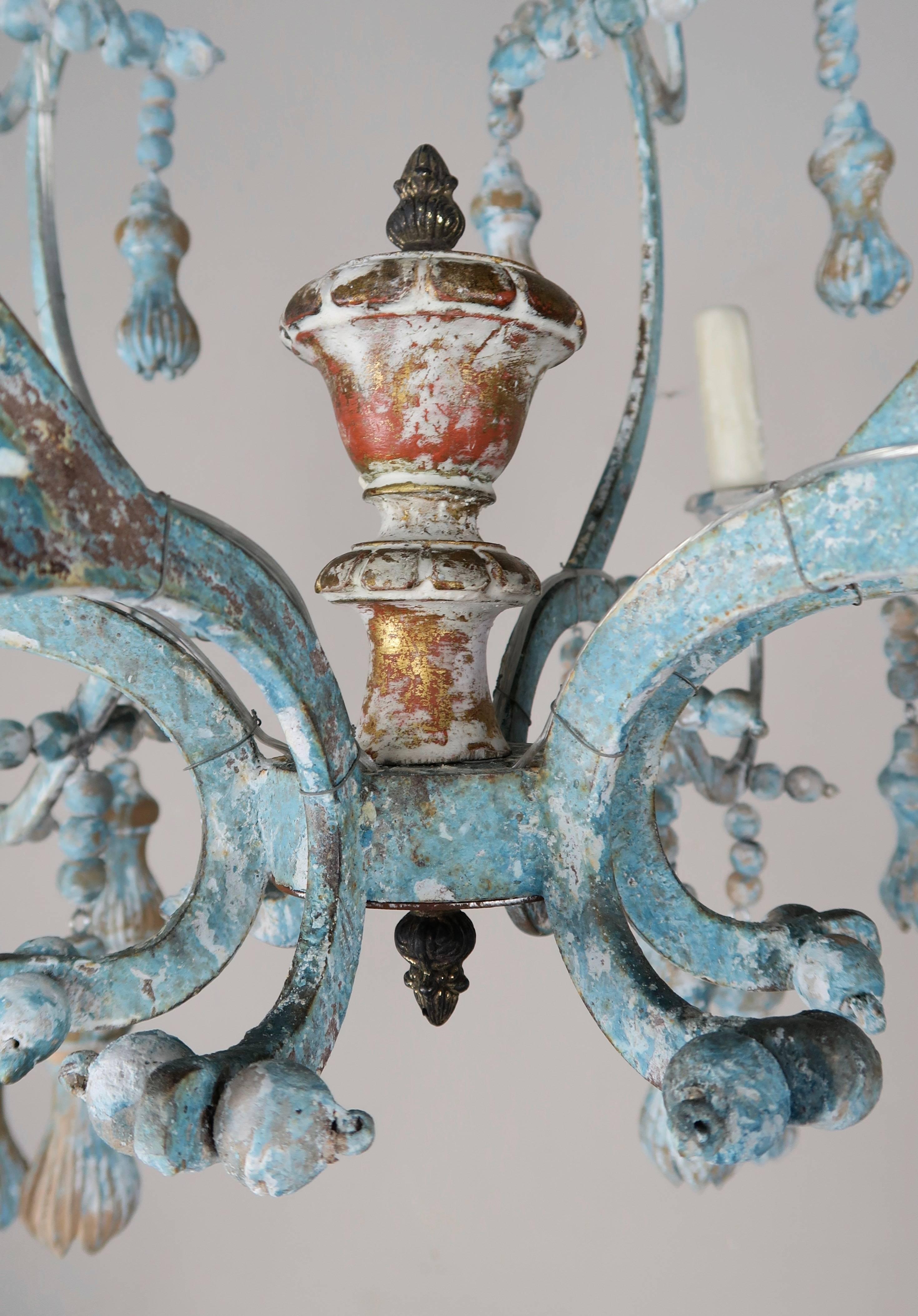 20th Century Carved Italian Wood Beaded and Iron Painted Chandelier